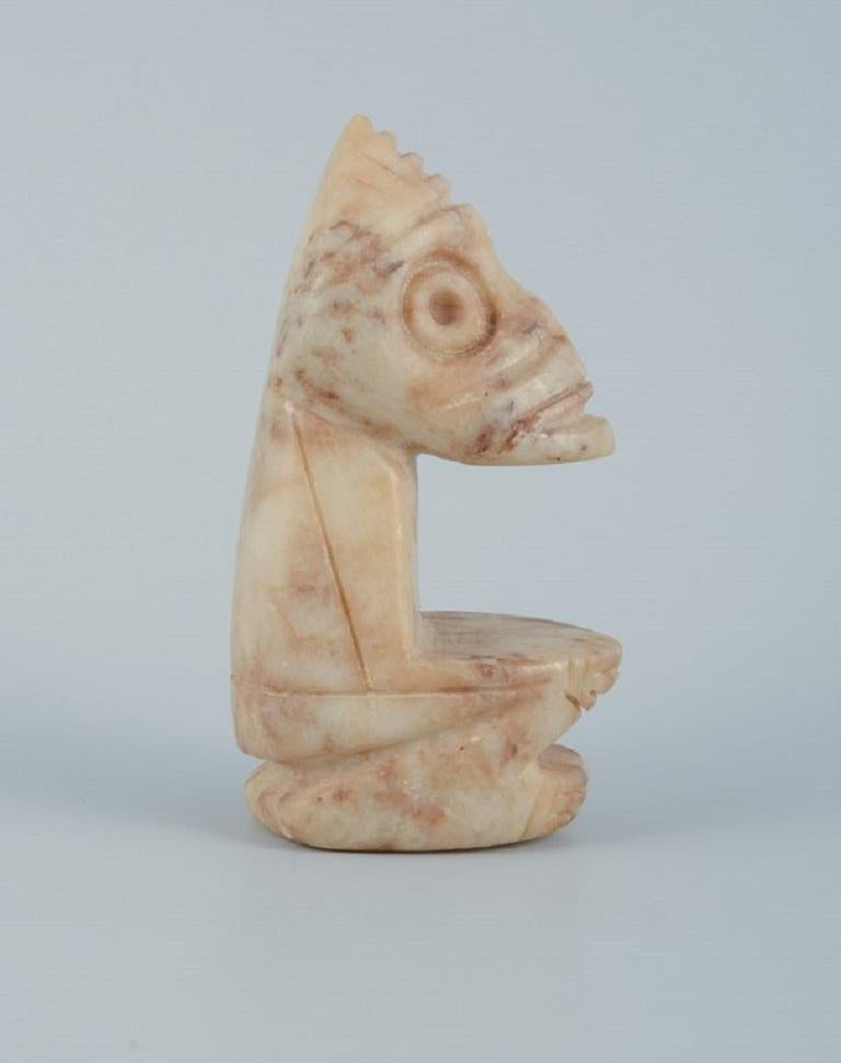 Greenlandica. Tupilak. Traditional, magic Greenlandic figurine carved in soapstone.
Approx. 1960-1970s.
In good condition, signs of use.
Dimensions: W 4.5 x D 6.0 x H 11.5 cm.