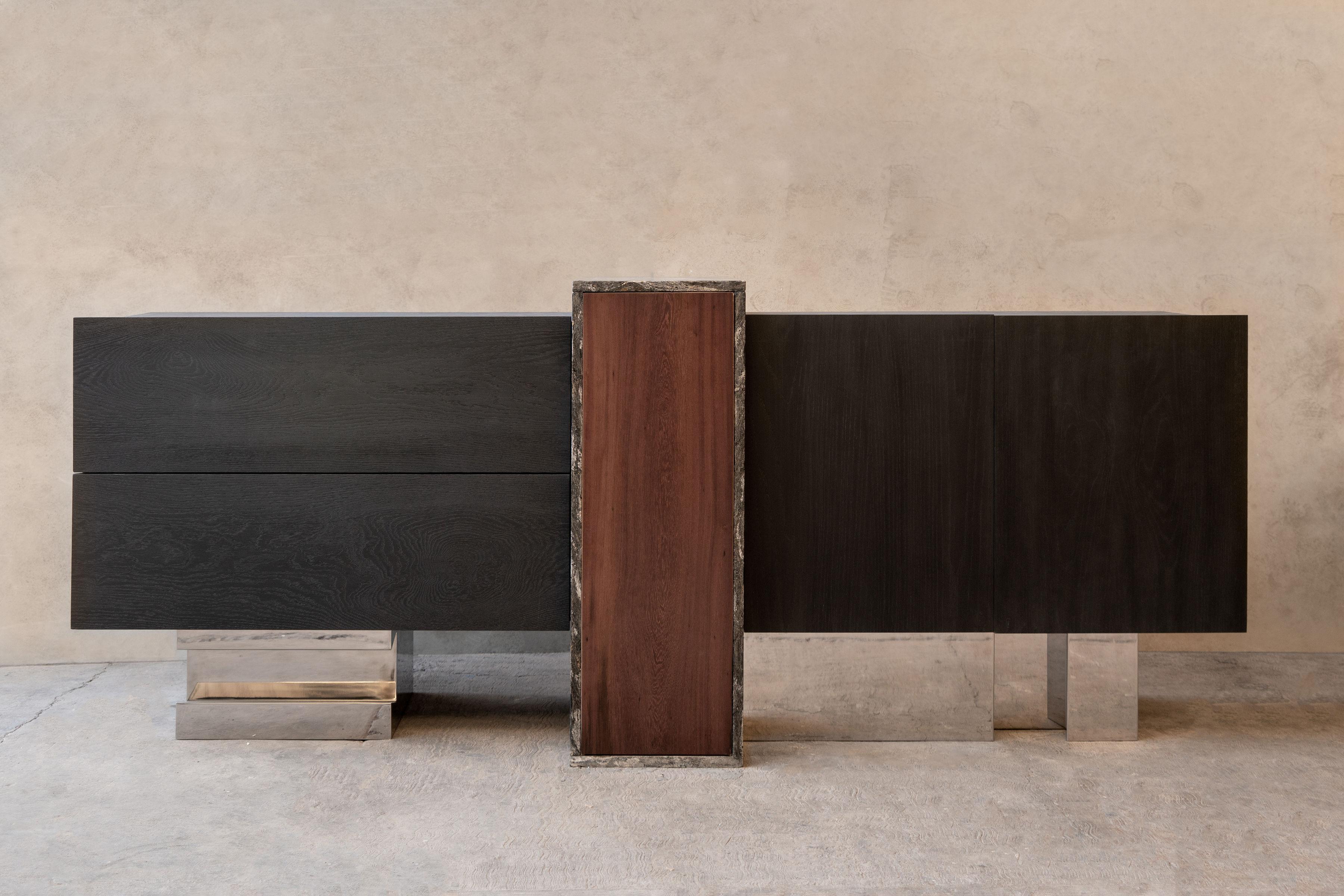 Greenwich console by Arturo Verástegui
Dimensions: D 300 x W 2.22 x H 75 cm
Materials: oak wood, Metalicus granite, Katalox wood, stainless steel.

Console made of burnt white oak, Metalicus granite, Katalox wood and stainless steel.

Arturo