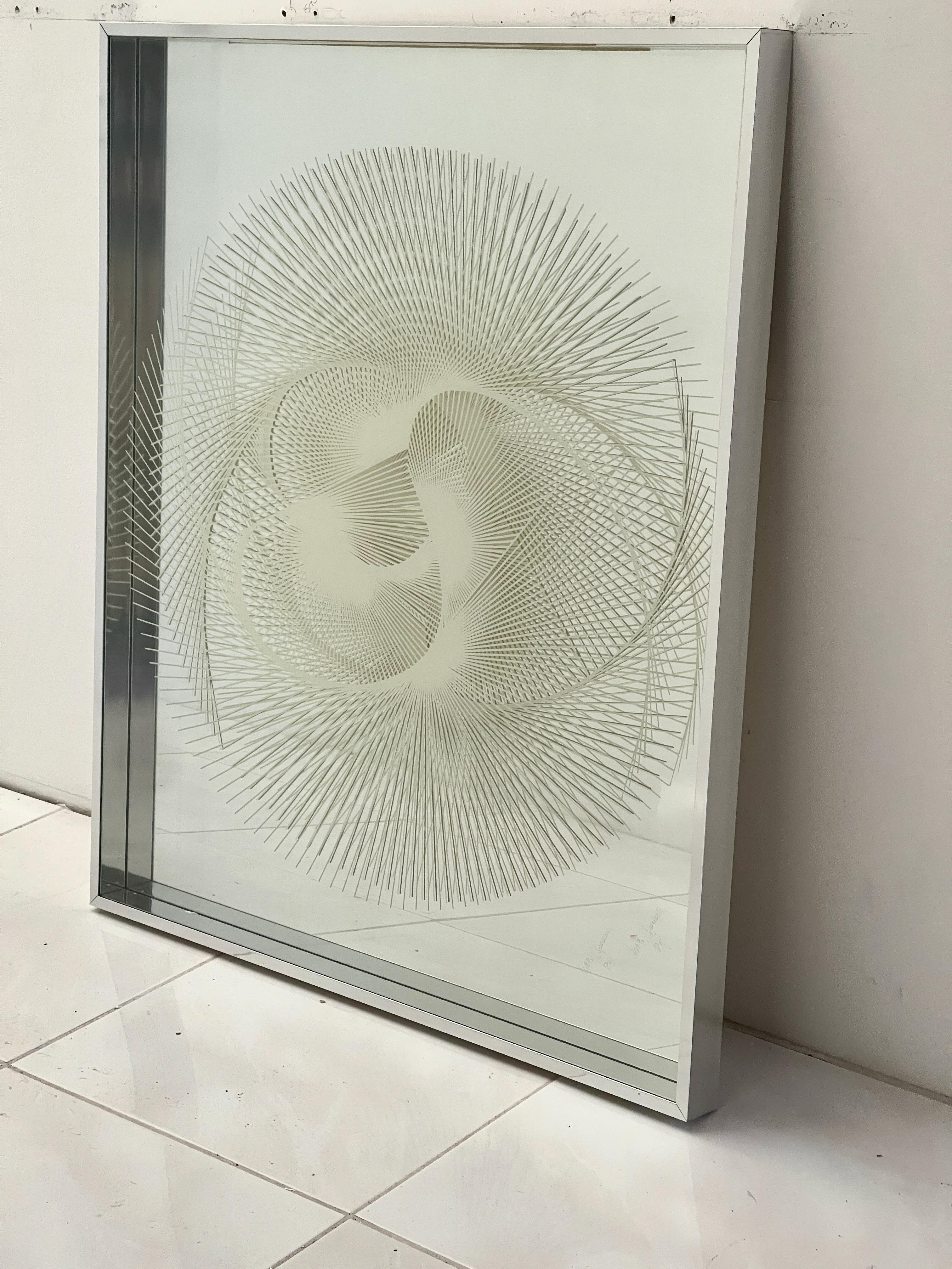 We have two of these signed and dated #859 Greg Copeland OpArt space age wall mirrors that are nearly an exact pair - the only difference besides the date is that the back mirror on one is a single piece while on the other it is segmented (see
