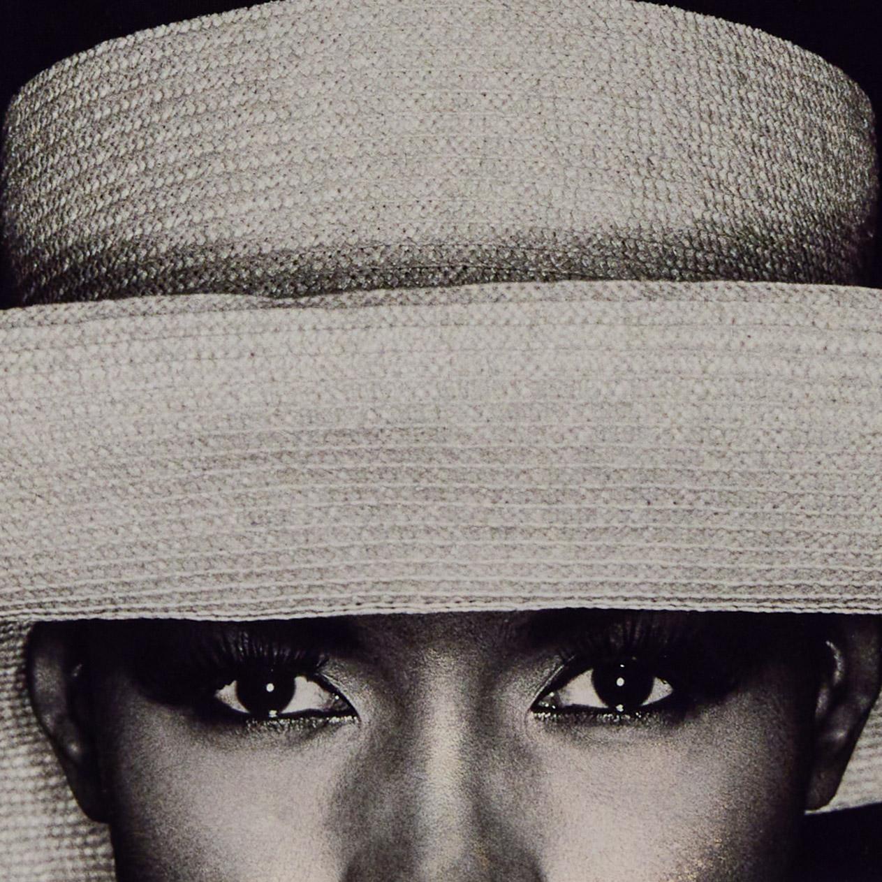 Grace with Hat - Contemporary Photograph by Greg Gorman