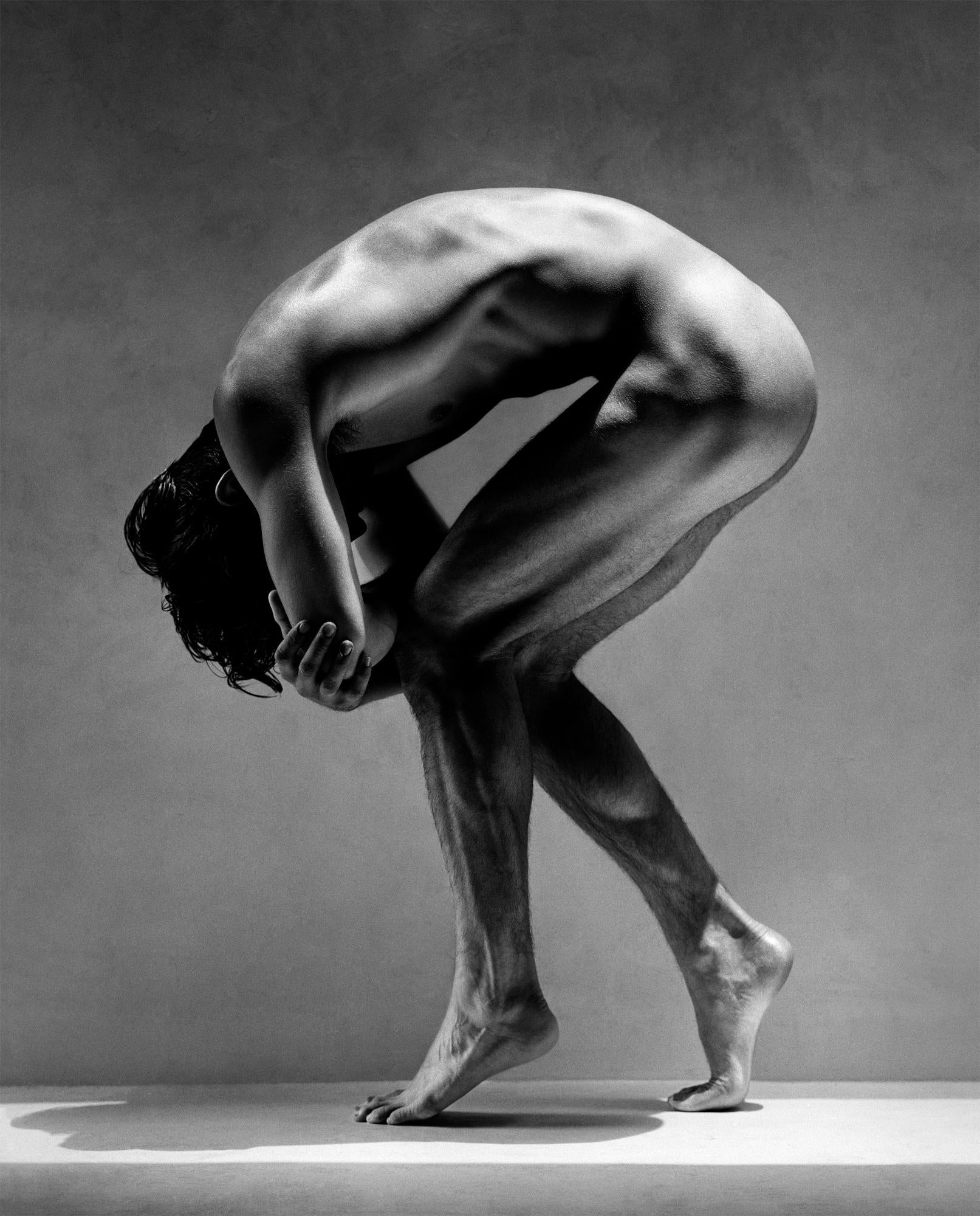 Greg Gorman Black and White Photograph - Tony Ward bend over, LA, 21st Century, Contemporary, Celebrity, Photography