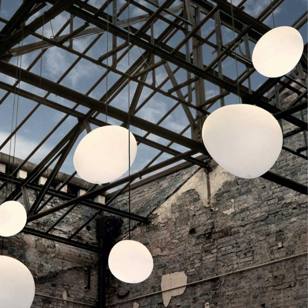 'Gregg' Outdoor Pendant by Ludovica and Roberto Palomba for Foscarini

Inspired by the shape of a pebble honed and smoothed by running water or the egg of a mythological creature, the 'Gregg' series for Foscarini features lamps that change depending