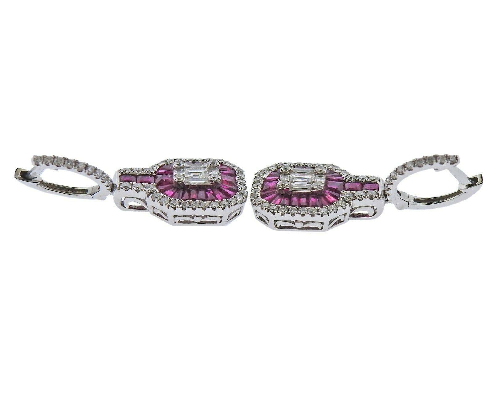 18k white gold earrings by Gregg Ruth. Set with 1.16ctw of VS-SI/GH diamonds, and 2.24ctw of rubies. Earrings are 30mm x 12mm. Marked - Gregg Ruth, 18k, D1.16, R2.24. Weight -7.2 grams. Retail $8350
