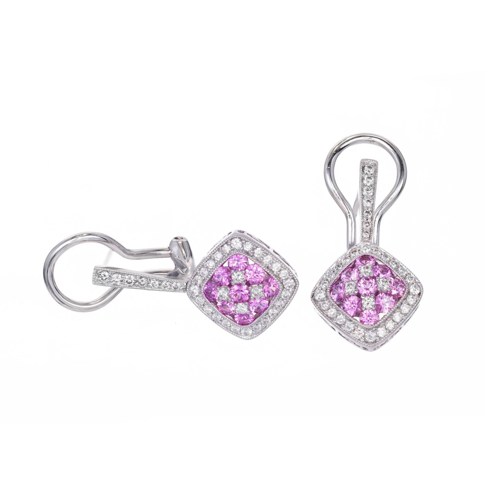 Gregg Ruth pink Sapphire Diamond dangle earrings. 18k white gold with clip and post.

68 round Diamonds, approx. total weight .47cts 
18 round pink Sapphires, approx. total weight .88cts 
18k white gold 
Top to bottom: 27.78mm or 1.09 inches 
Width: