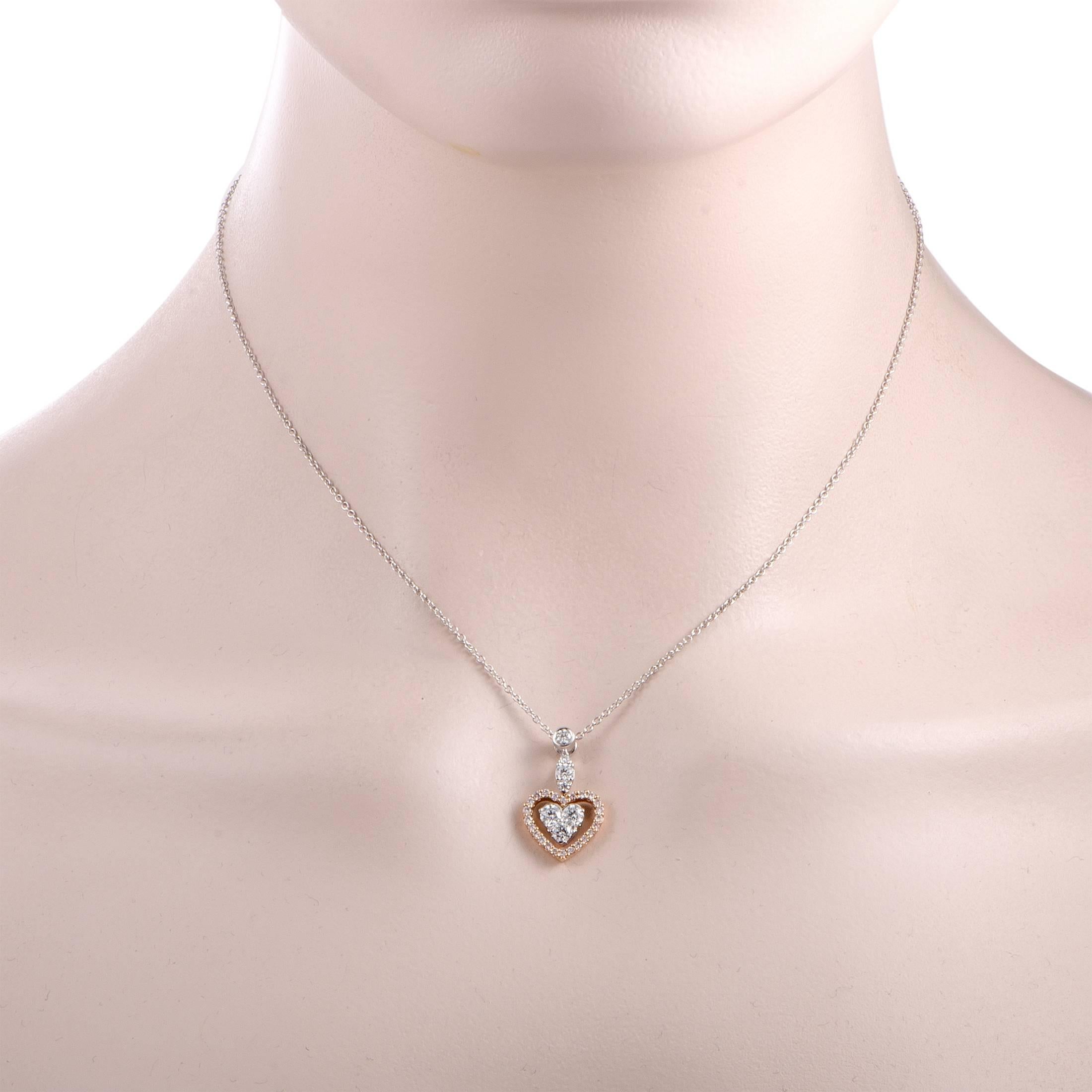 This gorgeous necklace is a Gregg Ruth design that is marvelously presented in stylish 18K white and 18K rose gold. The necklace features a lovely heart pendant that is decorated with diamonds amounting to 0.85 carats.