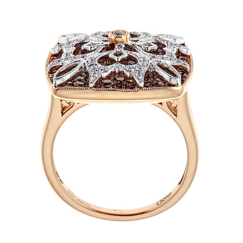 Gregg Ruth 1.92 Carat Diamond Designer Ring 18 Karat Rose Gold Fine Jewelry

Surprise your loved one with this statement ring, Designed by Gregg Ruth. This cocktail ring is fashioned in 18k Rose gold. White and chocolate diamonds are layered in this
