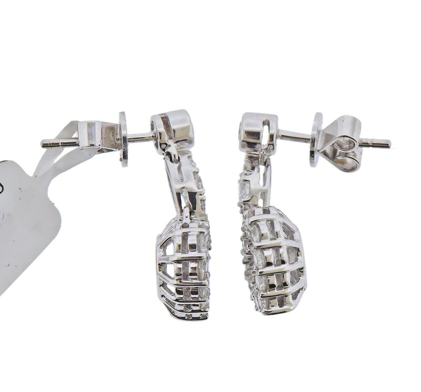 18k white gold earrings by Gregg Ruth. Set with 2.43ctw in VS-SI/GH diamonds. Earrings are 22mm x 13mm. Marked - 750, 5. Weight - 6.1 grams. Retail $12800, brand new store sample. 
