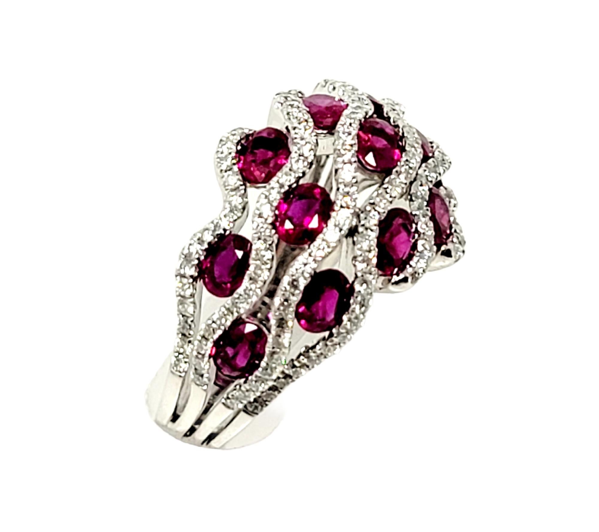 Ring size: 8

Breathtaking ruby & diamond cocktail ring bursting with vibrant color. This gorgeous piece absolutely dazzles with its rich red rubies and bright white diamonds. The curved dome shape paired with the wavy design creates a flattering,