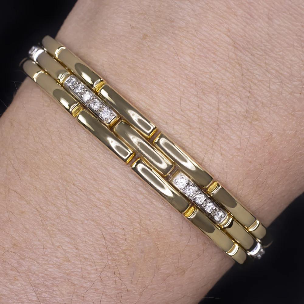 This elegant bracelet by renowned designer Gregg Ruth features a bold panther-style link design crafted in rich 18k yellow gold. Accented with 0.75 carats of brilliant round diamonds, it strikes the perfect balance between sleek sophistication and