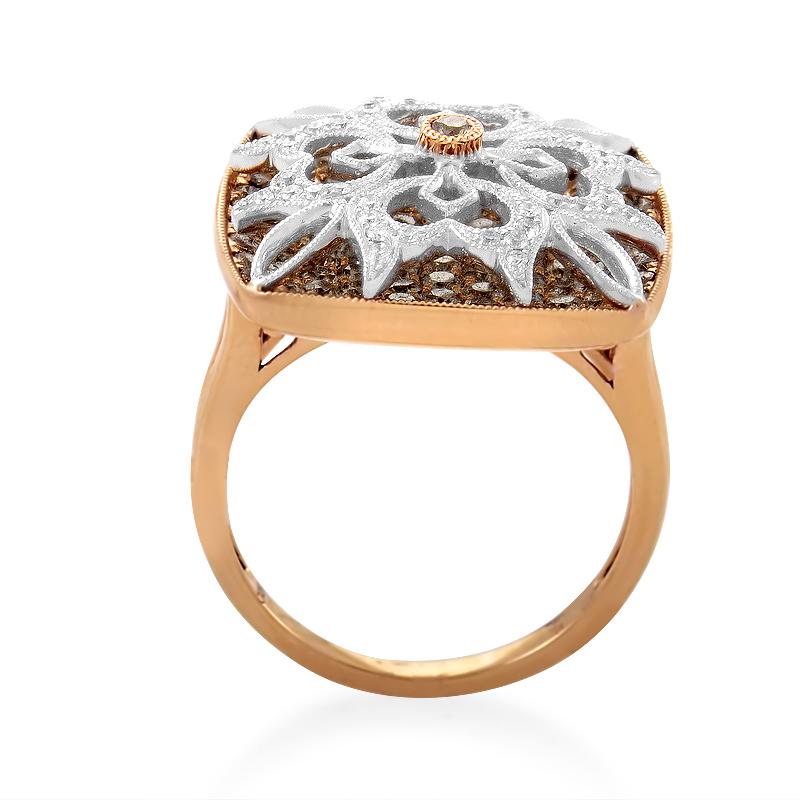 Intricate luxury radiates from this Gregg Ruth masterpiece. 18K rose gold gently pushes its hue through patterns of 1.92ct diamonds, adding extra depth to the three tiers of precious settings.
Ring Size: 6.5