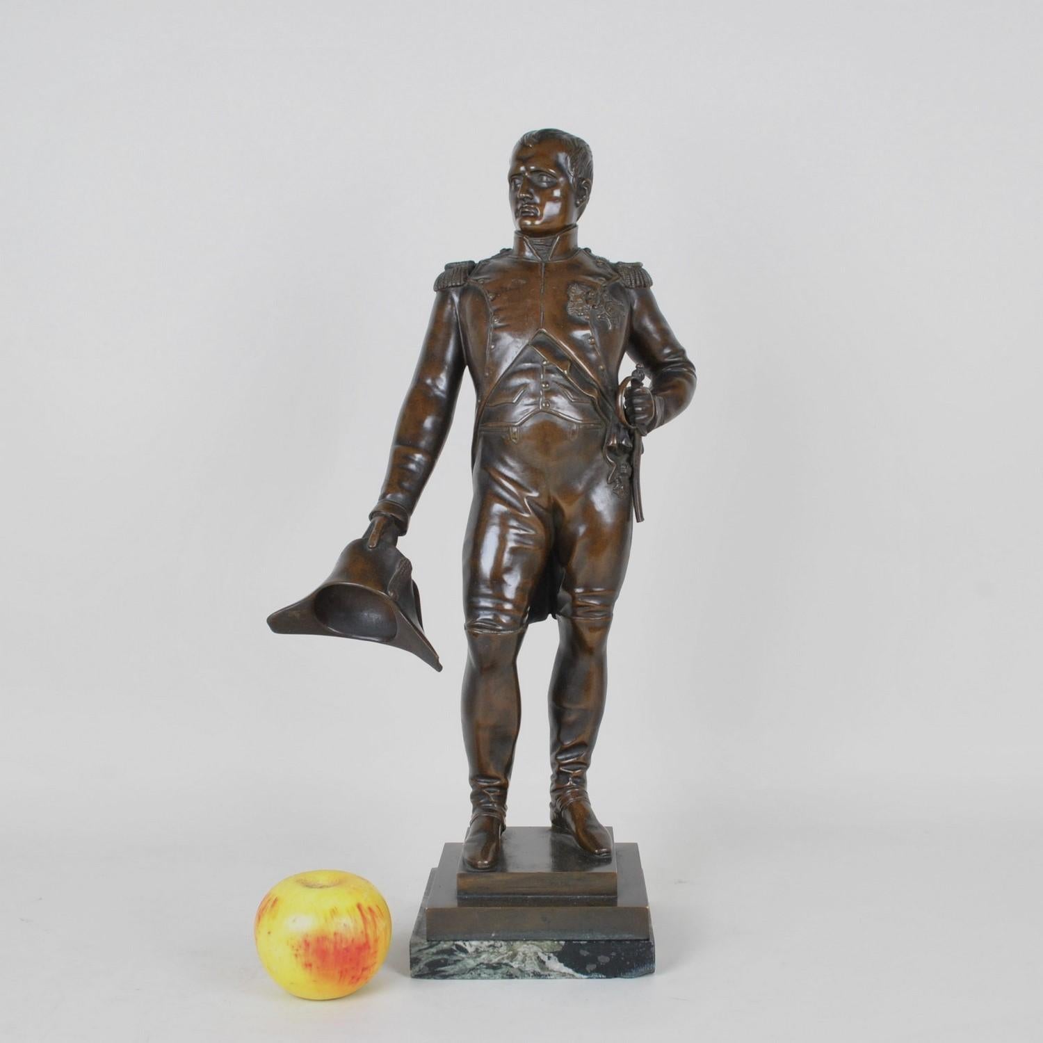 Bronze with raw patina representing Bonaparte as an officer, standing, tricorn in hand, signed Grégoire

Green marble base

Good general condition: wear of time to the patina, some chips on the marble and broken saber

JL Gregoire is a