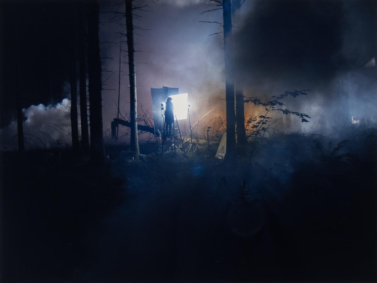 Gregory Crewdson Landscape Photograph - Production Still (Man in the Woods #2)