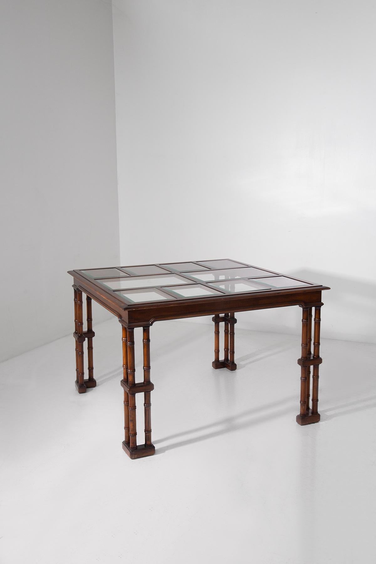 Gregotti's faux bamboo buffet tables with cut glass shelves. This refined 1970s-early 1980s buffet table, attributed to Vittorio Gregotti, is a true example of design elegance and craftsmanship. Made entirely of carved wood, it is distinguished by