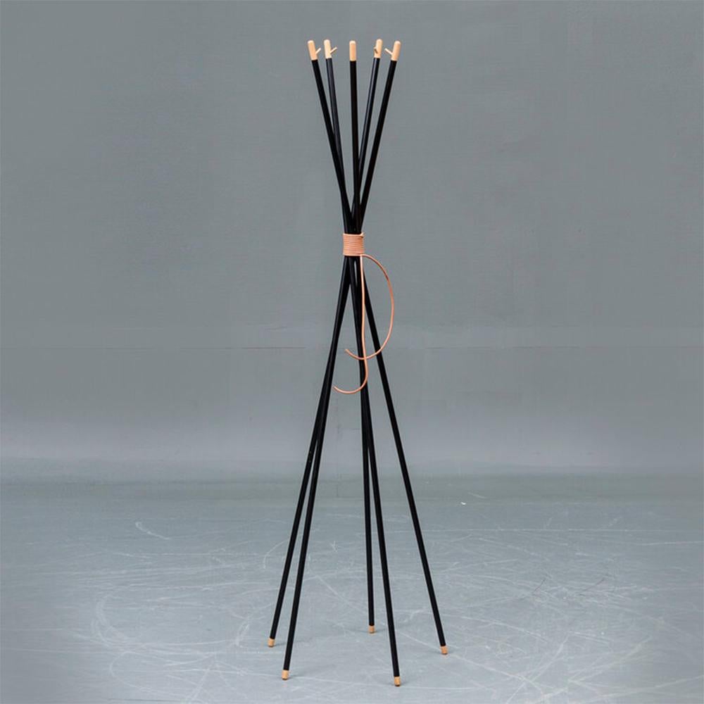 Gren coat stand by OxDenmarq
Dimensions: H 172 cm
Materials: Steel, leather, teak wood

OX DENMARQ is a Danish design brand aspiring to make beautiful handmade furniture, accessories and lighting in natural high-quality materials in fair prices.