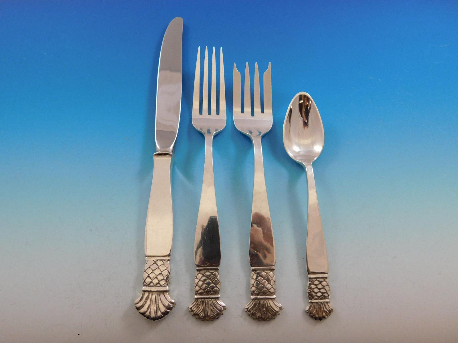 Rare 70 piece sterling silver set of Grenada made by Old Newbury Crafters. It is beautifully handwrought and heavy with innovative solid handle knives. The set includes:

12 knives with solid handles, 9