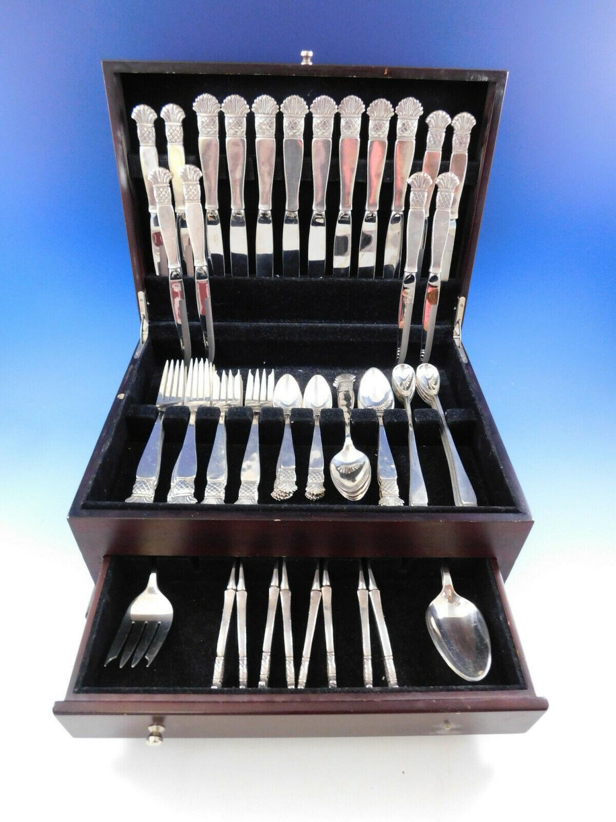 Superb 67 piece dinner size sterling silver set of Grenada made by Old Newbury Crafters. It is beautifully hand wrought and heavy with innovative solid handle knives. The set includes:

8 dinner size knives w/solid handles, stainless blades, 9