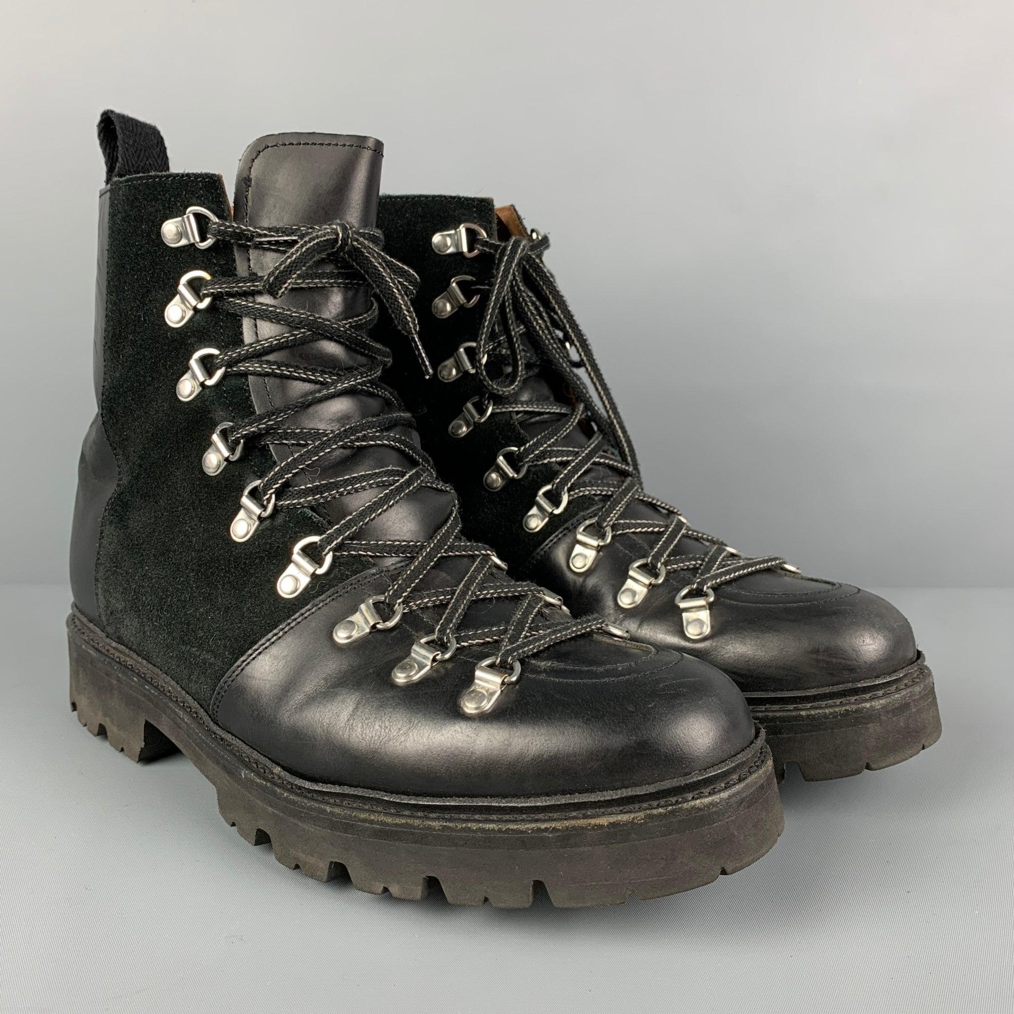 GRENSON boots comes in a black leather featuring a hiking style, suede panel, and a lace up closure. Comes with box. Very Good
Pre-Owned Condition. 

Marked:   110707 9 G  

Measurements: 
  Length: 12 inches  Width: 4.5 inches  Height: 6.25 inches