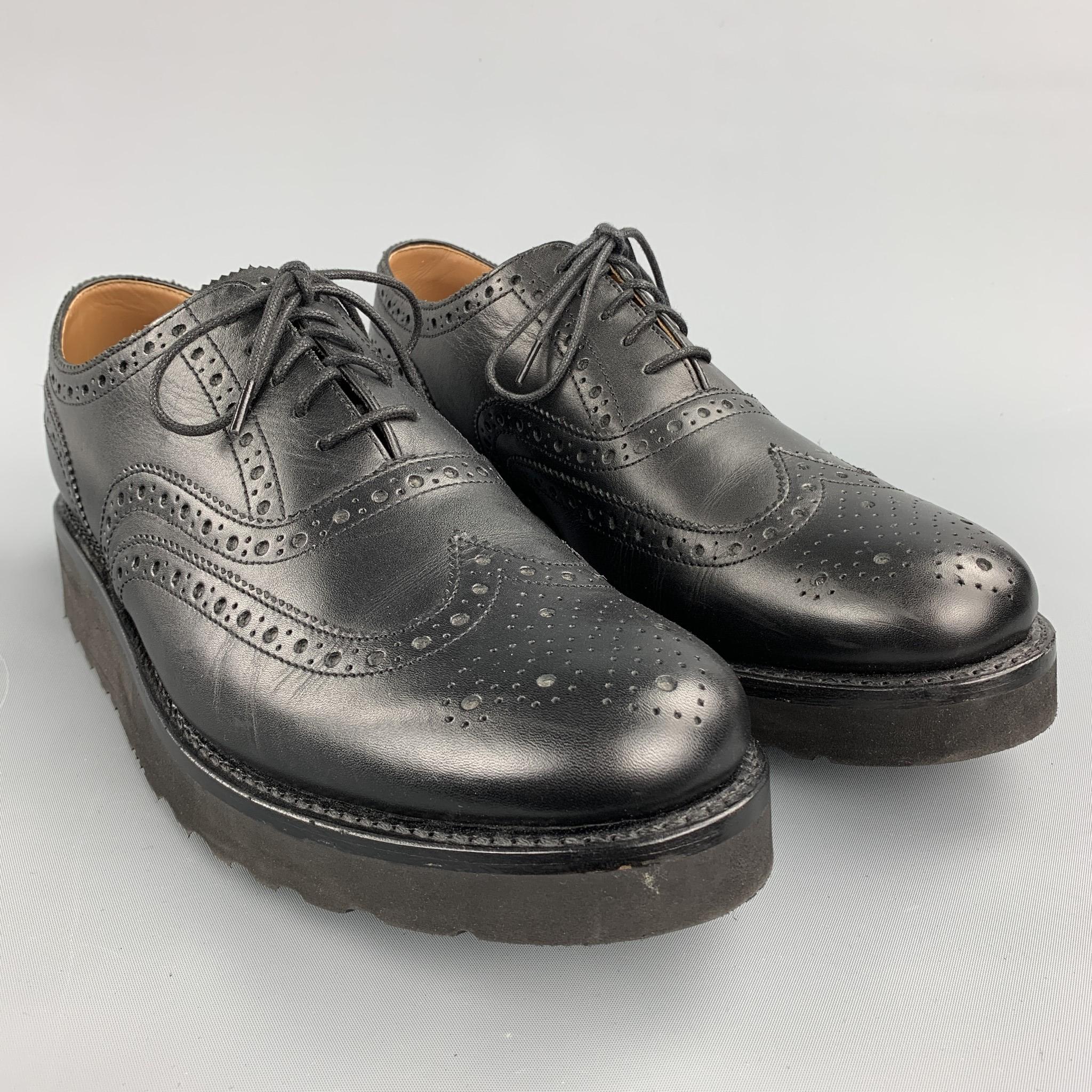 GRENSON lace up shoes comes in a black perforated leather featuring a wingtip, extra light style, and a rubber sole.

Excellent Pre-Owned Condition.
Marked: 10 G 

Outsole:

12.25 in. x 4.5 in. 