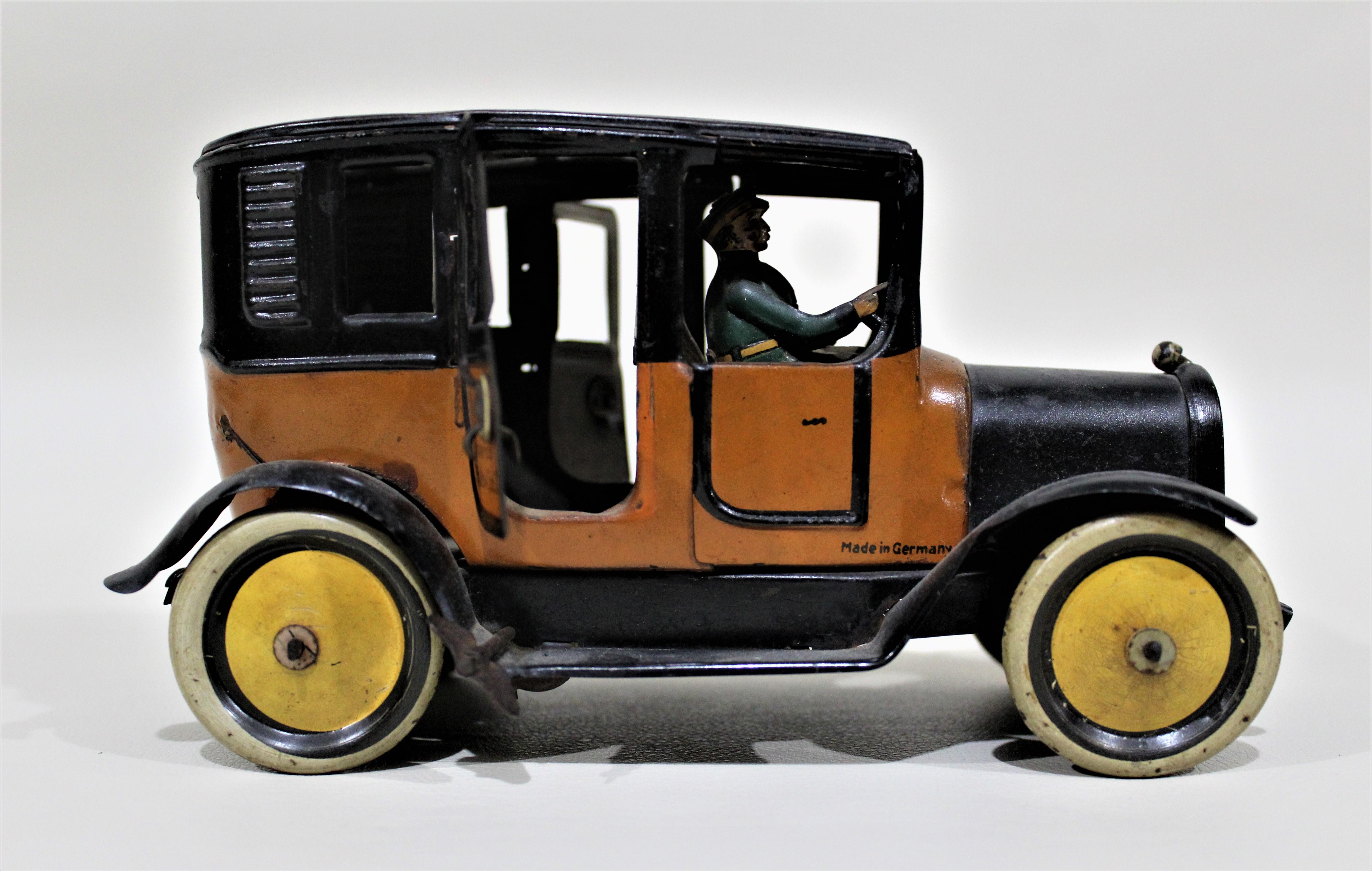 Greppert & Kelch Art Deco Era German Tin Toy Yellow Taxi In Good Condition In Hamilton, Ontario