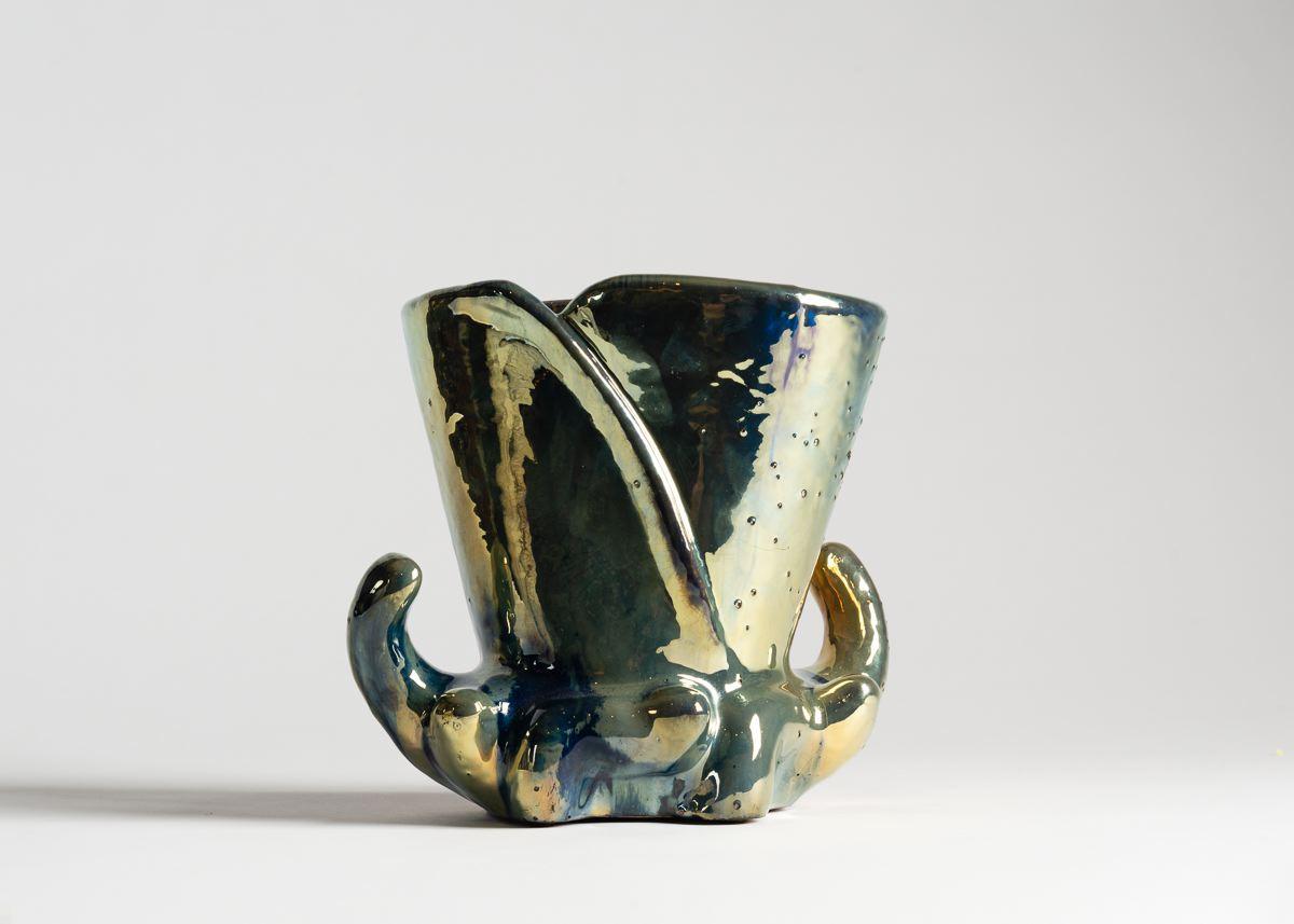 Stamped: GRE`S DE RAMBERVILLERS

Rambervillers is a city in Alsace-Lorraine, in eastern France, where in the late 19th century Alphonse Cyte're established a studio. This studio would produce masterwork ceramics by leading artists of the Nancy