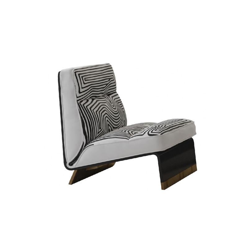 L'édition spéciale Greta 2020 est un fauteuil en cuir imprimé saisissant, doté d'un revêtement en cuir blanc et d'un motif unique imprimé en noir. Les coussins sont fabriqués à partir d'un remplissage en mousse de polyuréthane à densité
