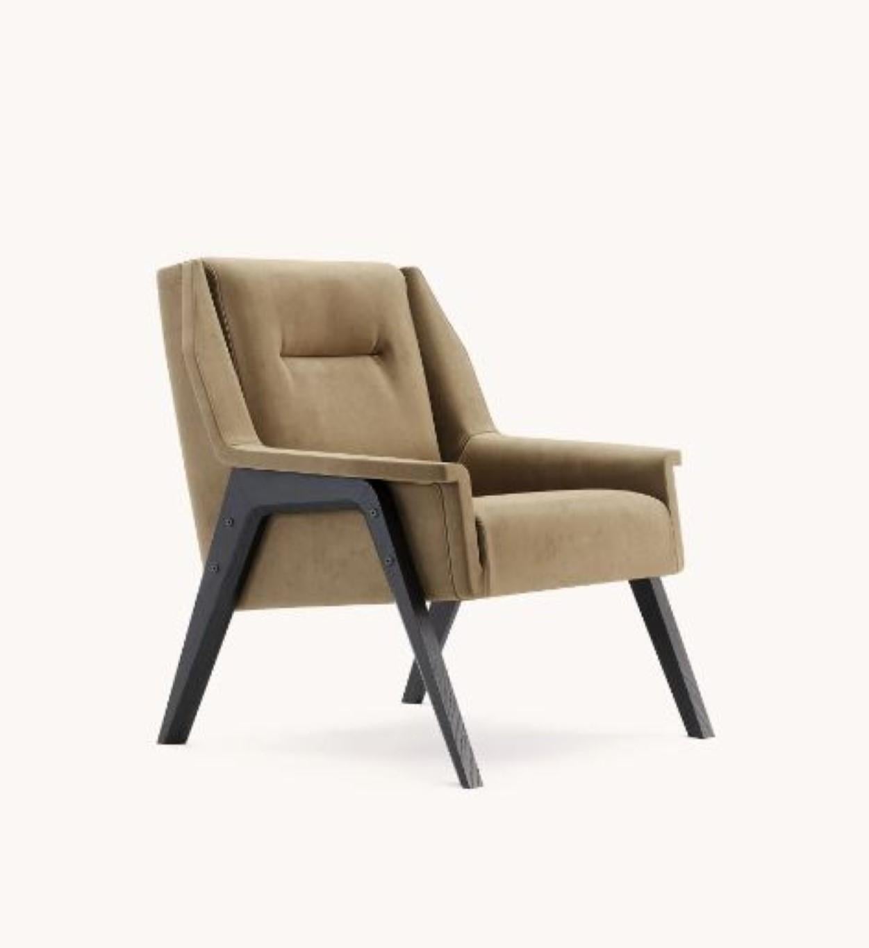 Greta armchair by Domkapa
Materials: Velvet, Black Ash.
Dimensions: W 73 x D 77 x H 85 cm. 
Also available in different materials and colors.  

Greta armchair is proof that aesthetics and ergonomics when combined, result beautifully. Available