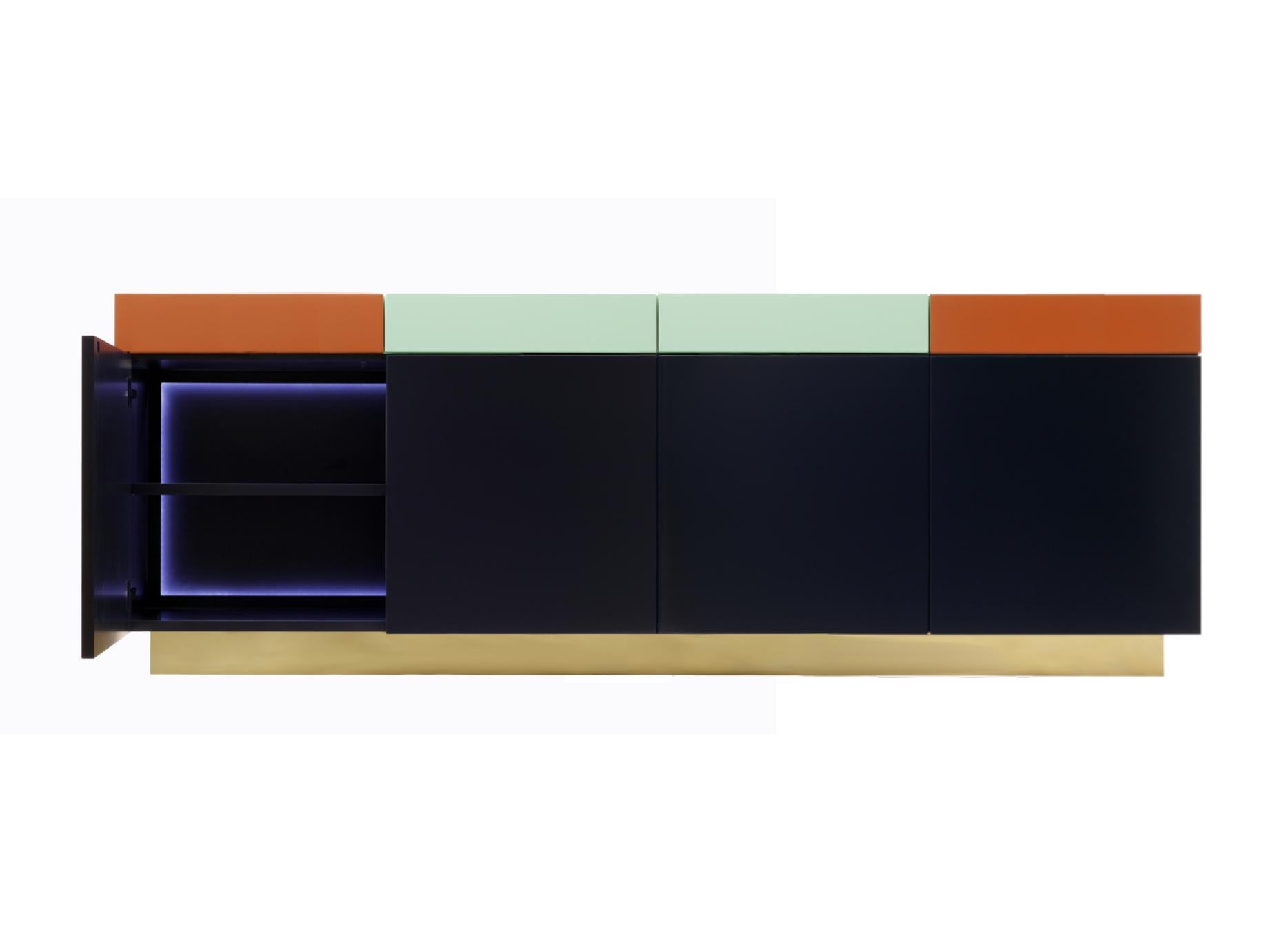 A functional and practical cabinet, based on a discrete elegance, Greta combines a playful geometrical shapes, colors and woodwork.
The outside is formed by 4 drawers on top and 4 doors beneath them, all of which with the lacquer color painting,