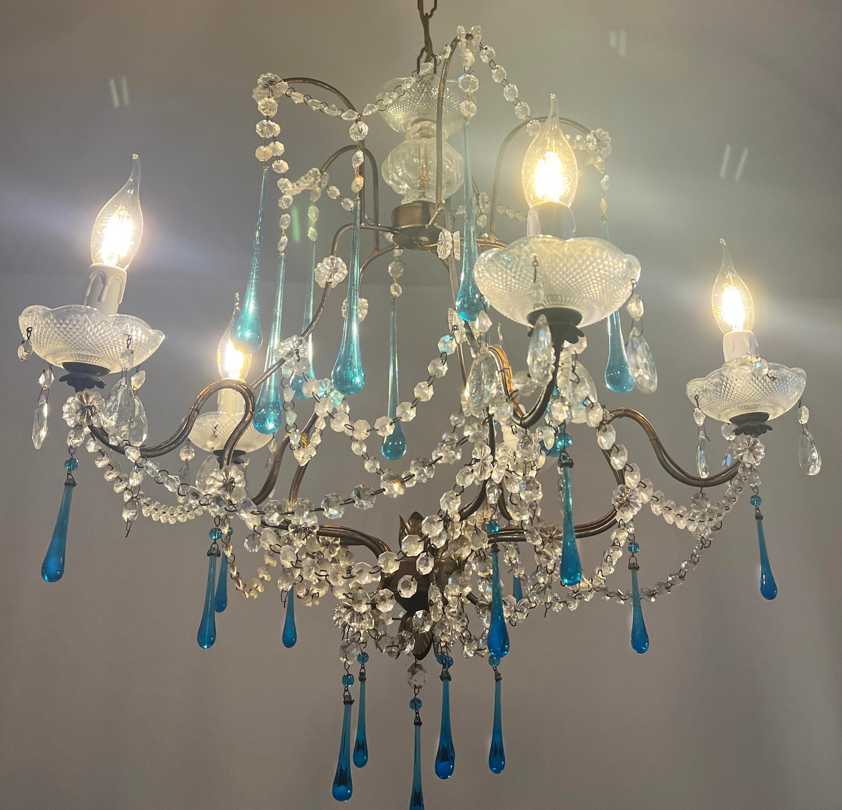 Fascinating Murano chandelier inspired by the divine Greta Garbo whose tears, legend has it, were the same color as her eyes.