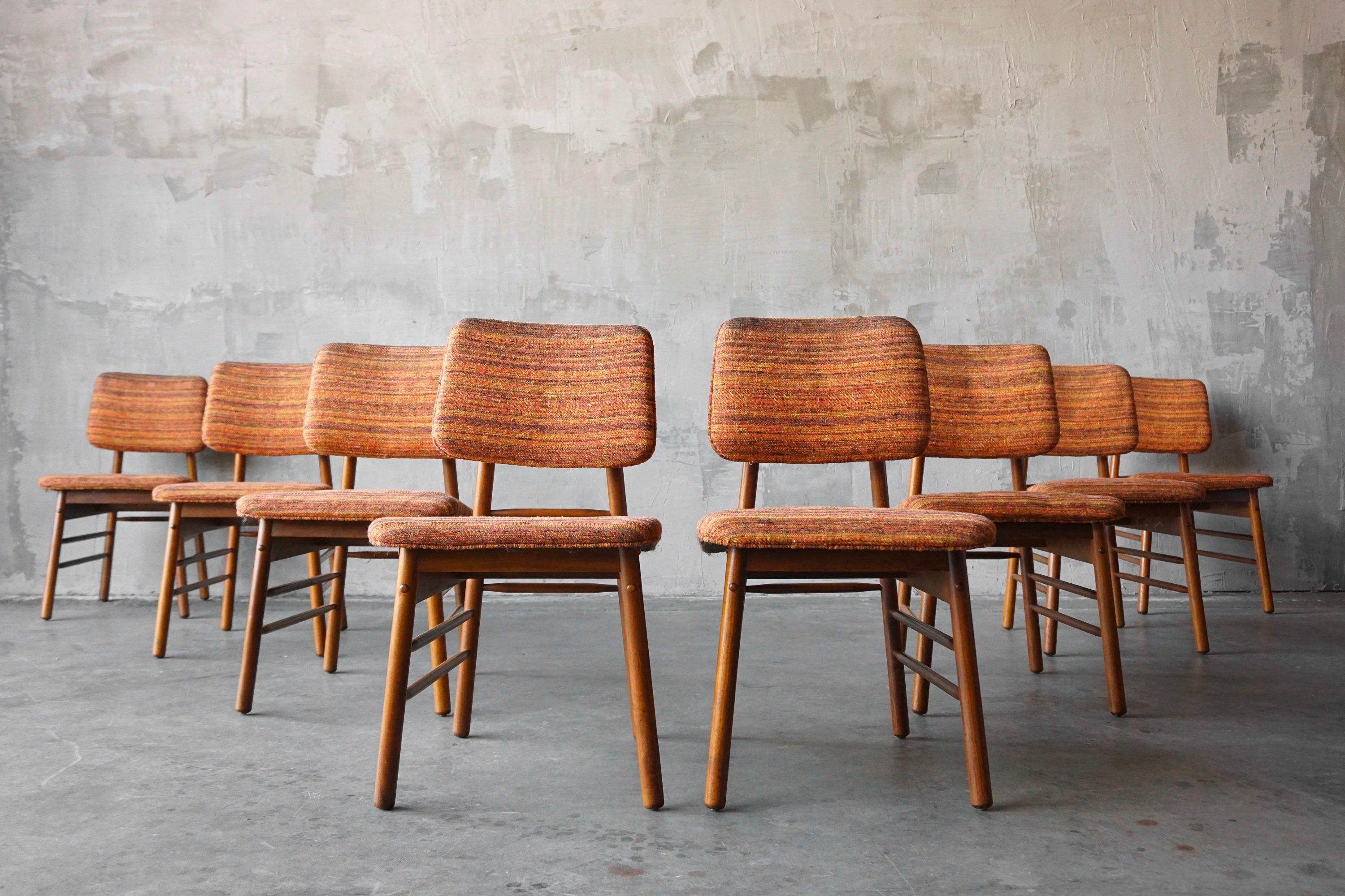 Set of 8 dining chairs by Greta Grossman for Glenn of California. 

Each is in nice original condition and present very well. Typical minor scuffs, etc. present. While original upholstery is in good condition, the foam has hardened and could stand