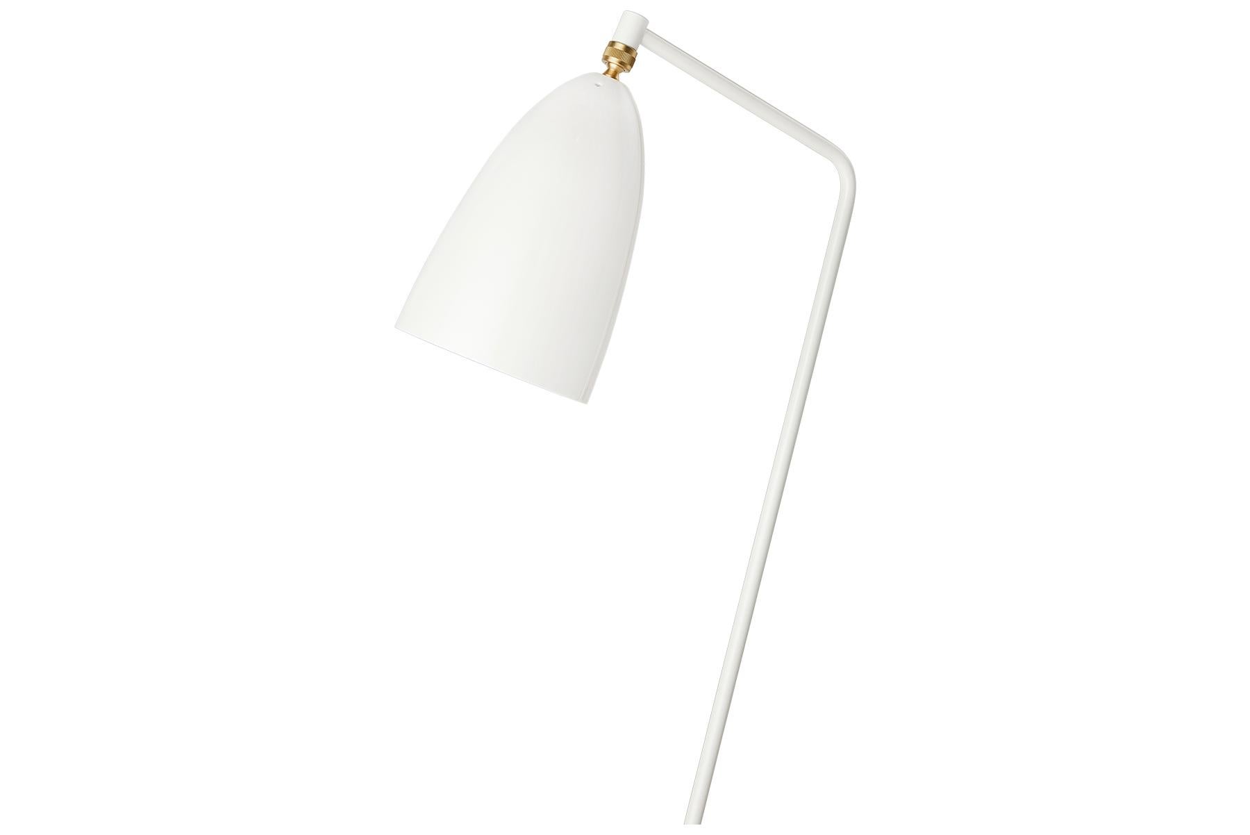 The iconic Grasshopper floor lamp was first produced in 1947 by the feminine pioneer Greta M. Grossman. The unique tripod stand of the Grasshopper Floor Lamp is tilted backward and gives the impression that the lamp is somehow alive and stalking its