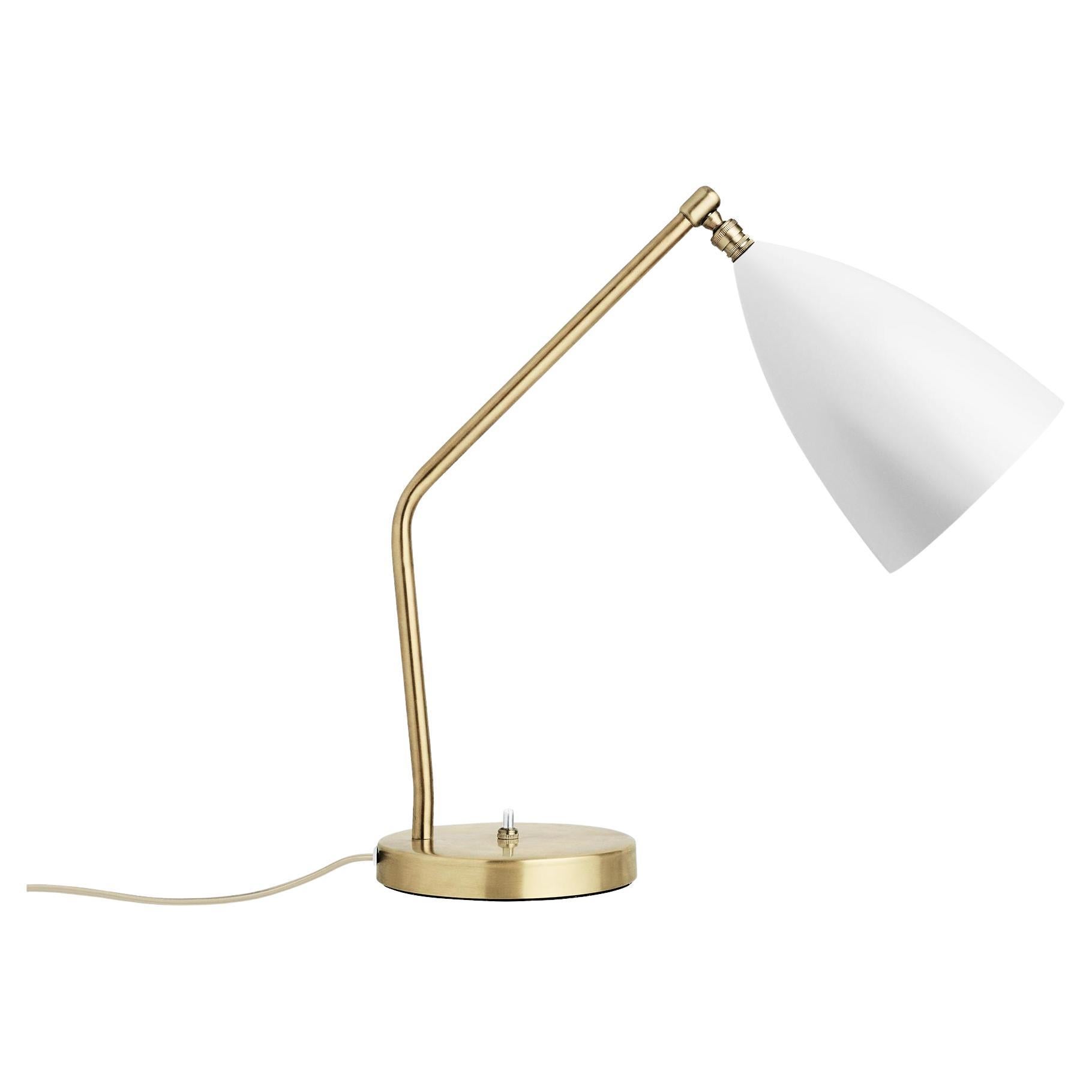 Greta M. Grossman designed the iconic Gräshoppa table lamp in 1947 and with its sophisticated yet playful design, it is still as relevant today. The distinctive, elongated conical shade is beautifully combined with a tubular brass stand, a great