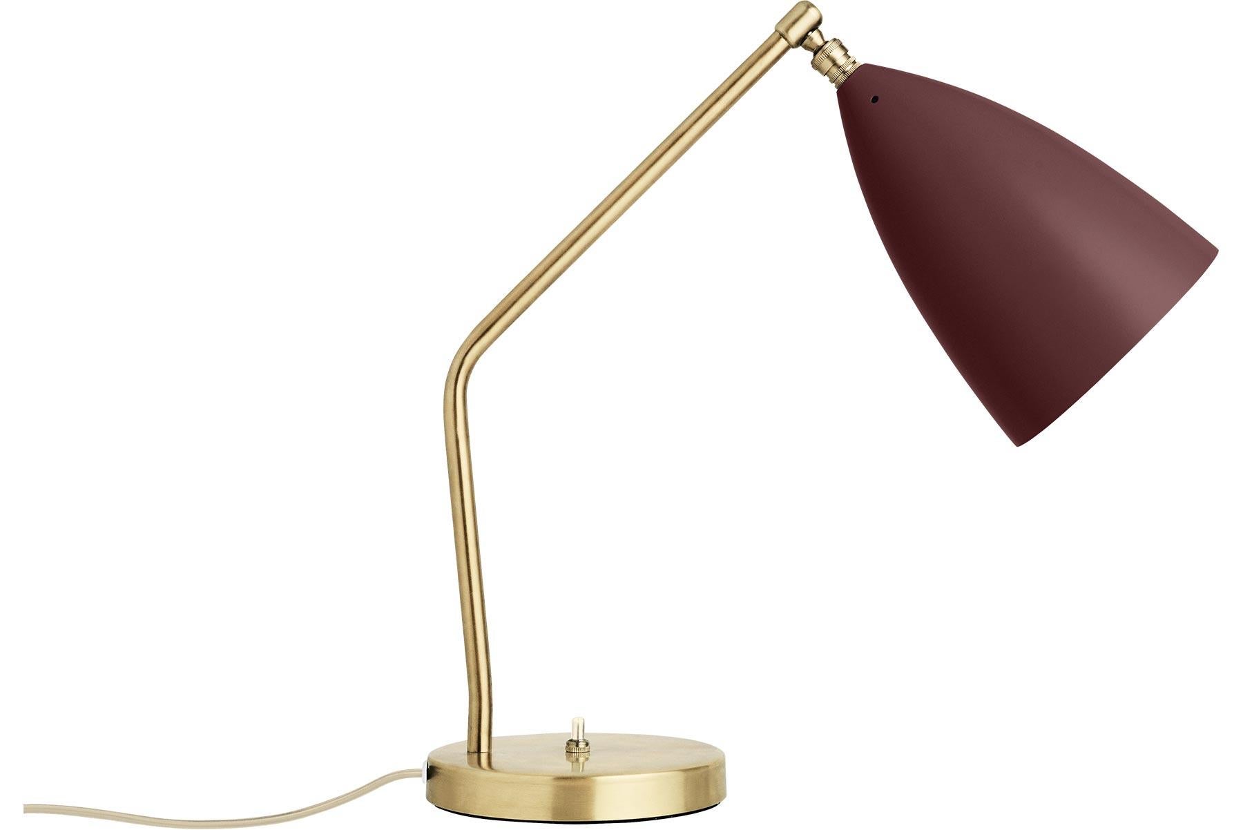 Greta M. Grossman designed the iconic Gräshoppa Table Lamp in 1947 and with its sophisticated yet playful design, it is still as relevant today. The distinctive, elongated conical shade is beautifully combined with a tubular brass stand, a great