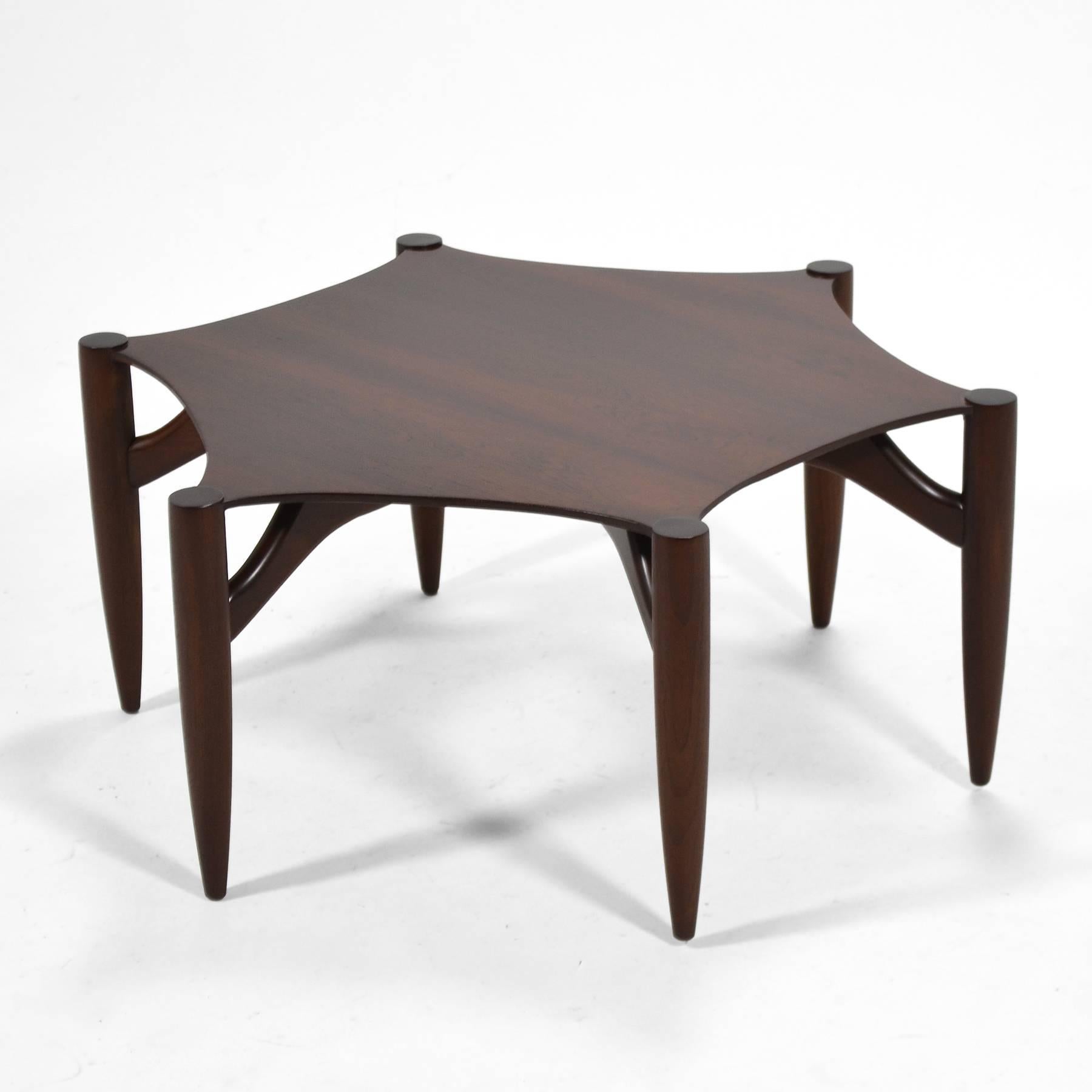 This stunning and rare Greta Grossman coffee table by Glenn of California has a beautiful rosewood top supported by six sculptural legs.