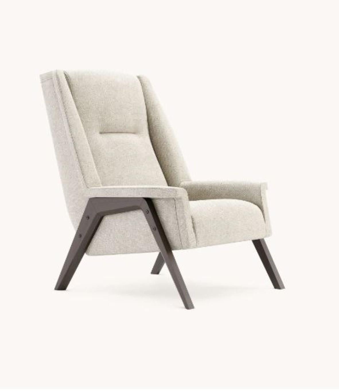 Greta H armchair by Domkapa
Materials: Solid wood: Fumé stained beech, upholstery. 
Dimensions: W 73 x D 86 x H 105 cm. 
Also available in different materials.

Greta armchair is proof that aesthetics and ergonomics when combined, result