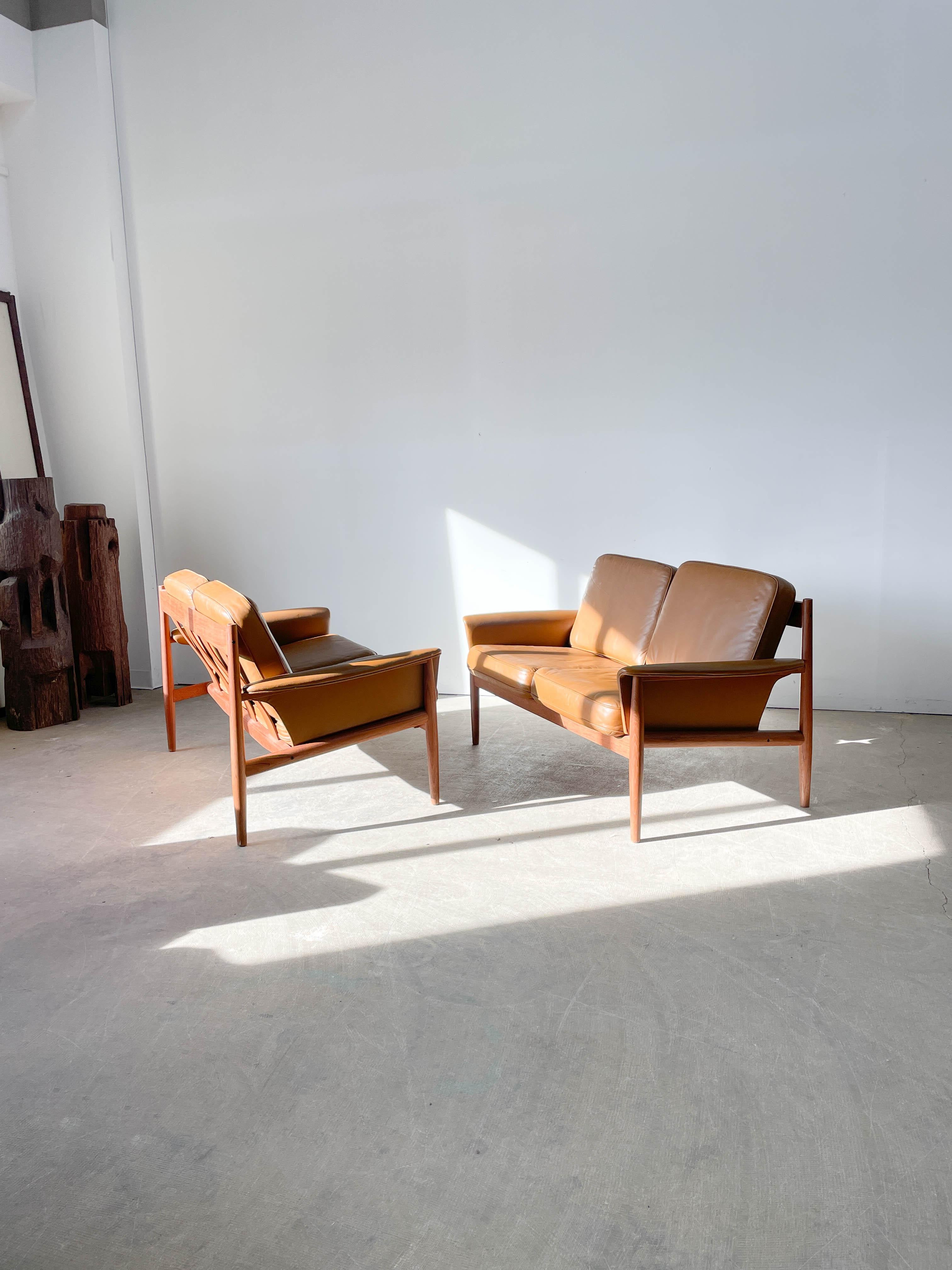 Danish Greta Jalk teak and leather loveseats for France and Son For Sale