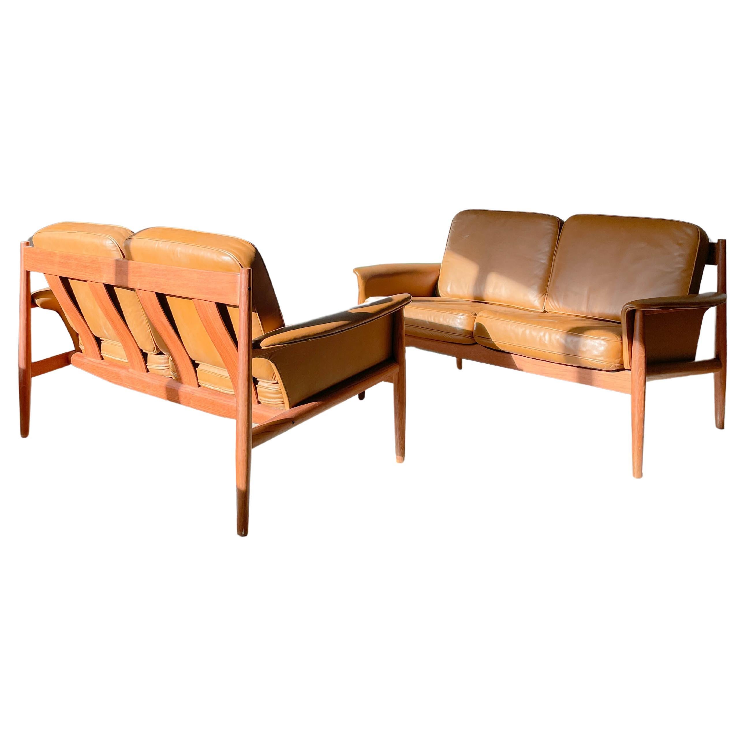 Greta Jalk teak and leather loveseats for France and Son For Sale