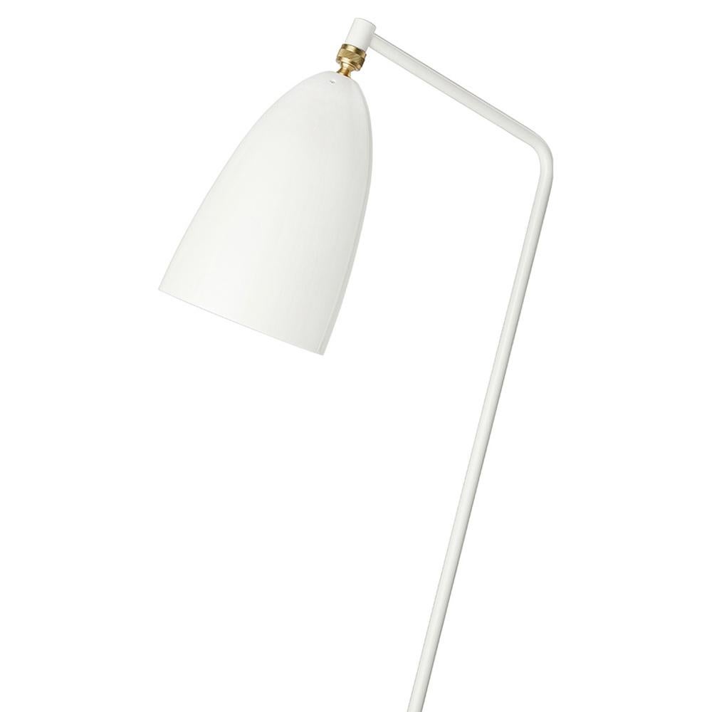 The iconic Gräshoppa Floor Lamp was first produced in 1947 by the feminine pioneer Greta M. Grossman. The unique tripod stand of the Gräshoppa Floor Lamp is tilted backwards and gives the impression that the lamp is somehow alive and stalking its