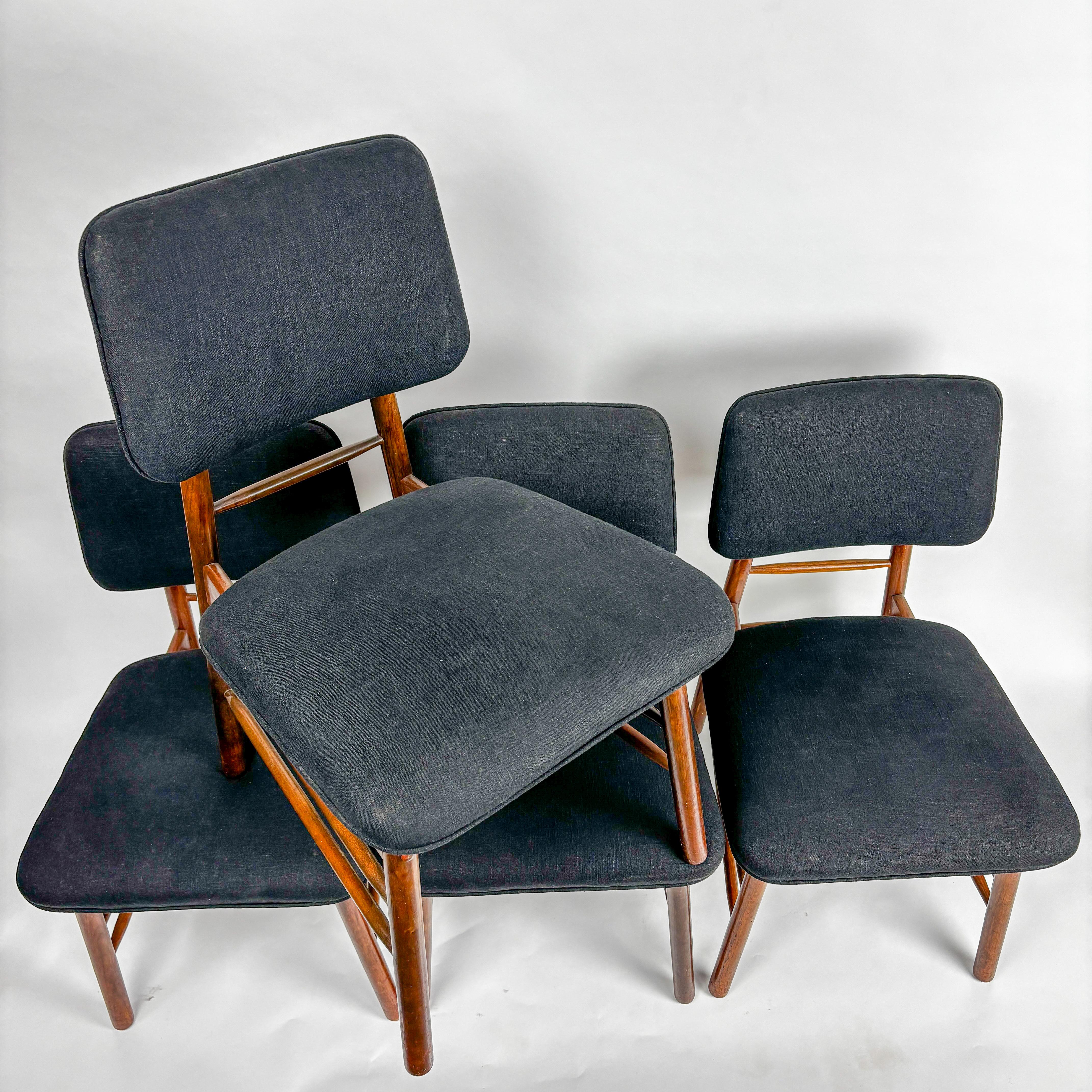 Greta Magnuson Grossman for Glenn Of California.
4 seat dining set in Walnut recently upholstered in cotton linen.

Stunning in person the floating seat design is one that is always attractive and comfortable.
