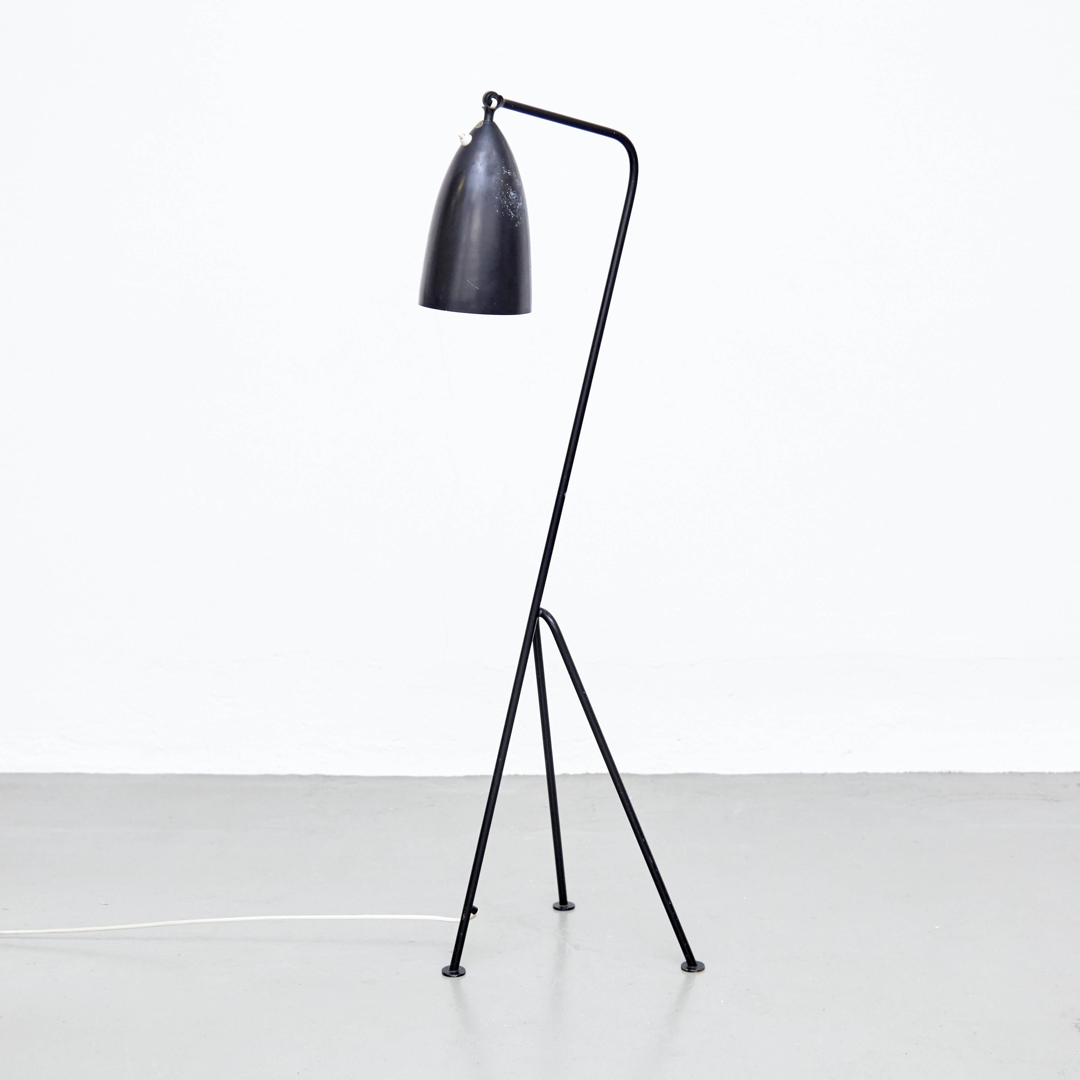 Floor lamp designed by Greta Magnusson Grossman in Sweden, circa 1947.

In good original condition, with minor wear consistent with age and use, preserving a beautiful patina.

Greta Magnusson-Grossman (July 21, 1906 – August 1999) was a Swedish