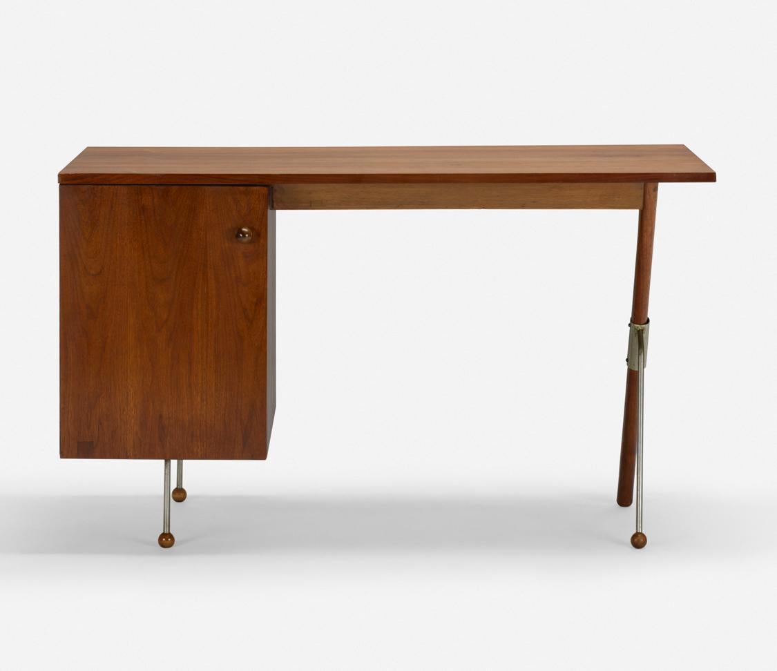 Beautiful desk by Greta Magnusson Grossman, Sweden, circa 1952. Walnut and enameled steel. Desk features one door concealing two drawers and one pull-out work surface.
Literature: Greta Magnusson Grossman, Kane, pg. 28.