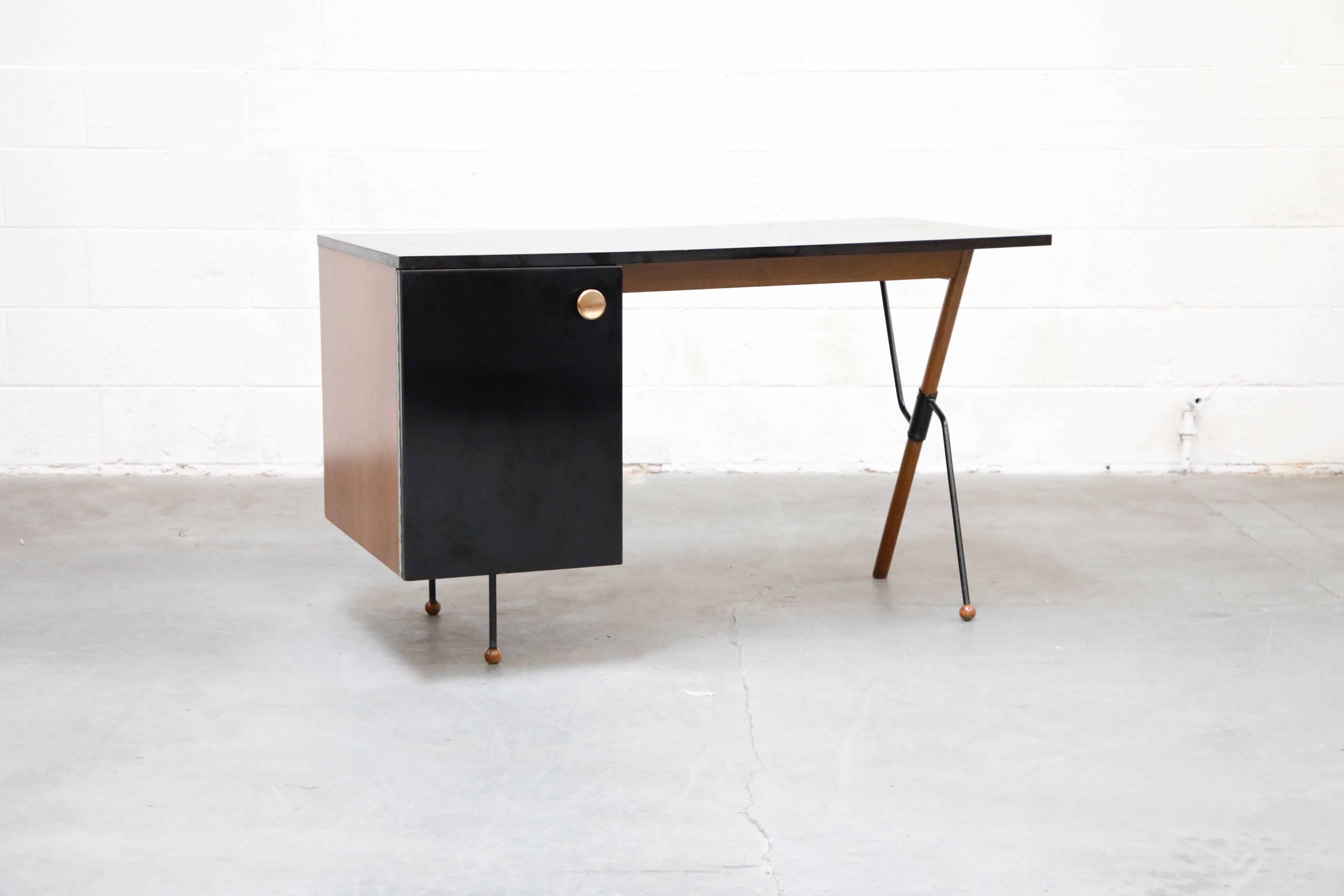 This incredible collectors piece is a fully restored 'Series 62' desk by Greta Magnusson-Grossman for Glenn of California. Designed in 1952, this signed example is an early production original example with Glenn of California stamp underneath. This