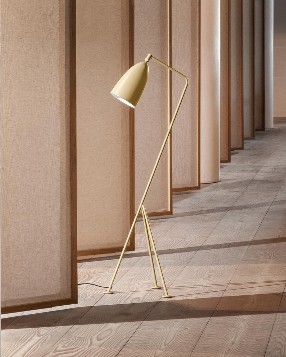 Greta Magnusson Grossman 'Grasshopper' floor lamp in olive brown. Designed in 1947 by Grossman, this is an authorized re-edition by GUBI of Denmark who meticulously reproduces her work with scrupulous attention to detail and materials that are