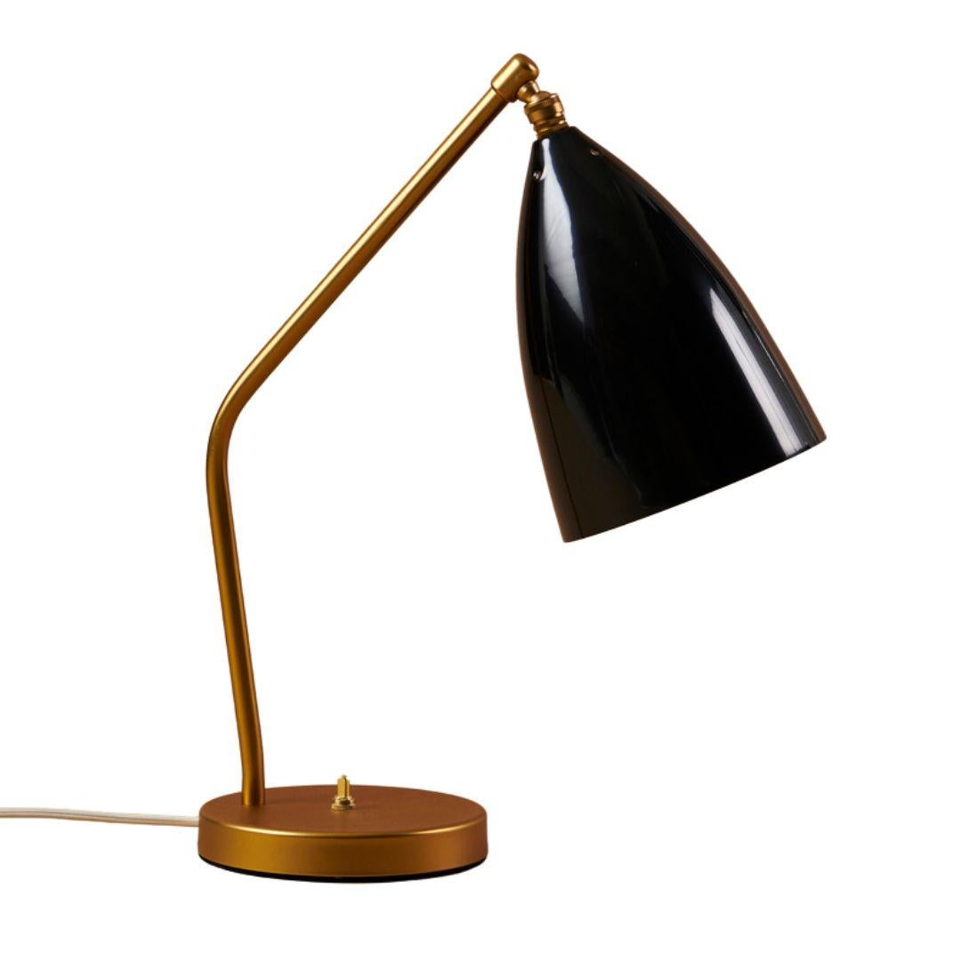 Greta Magnusson Grossman 'Grasshopper' table lamp in glossy black.

Designed in 1947 by Grossman, this is an authorized re-edition by GUBI of Denmark who meticulously reproduces her work with scrupulous attention to detail and materials that are