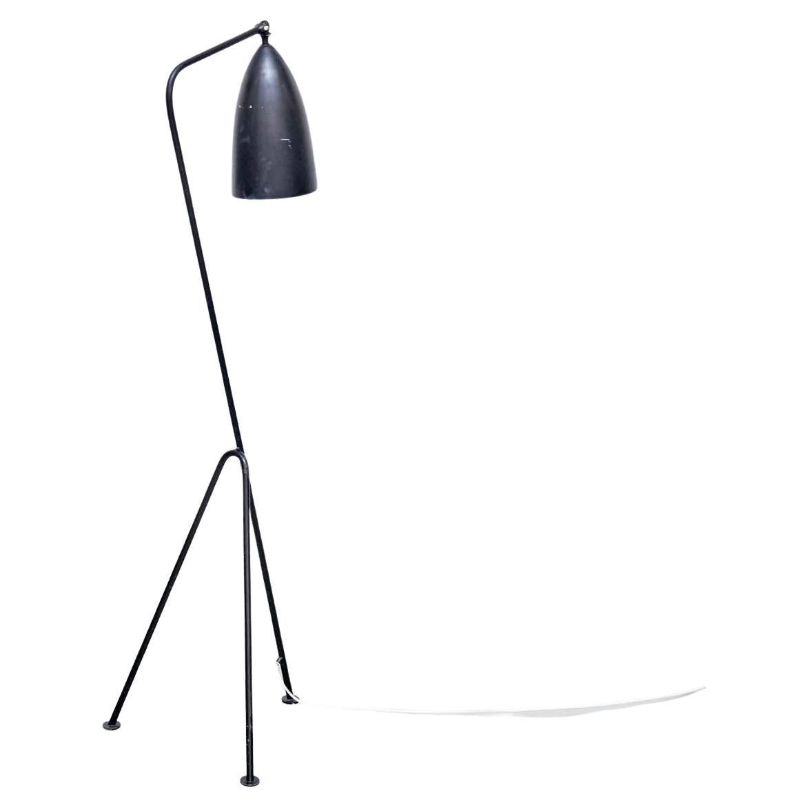 Floor lamp designed by Greta Magnusson Grossman in Sweden, circa 1947.

Embrace the timeless elegance of Mid Century Modern design with this exceptional Grasshopper floor lamp, created by renowned Swedish designer Greta Magnusson Grossman circa
