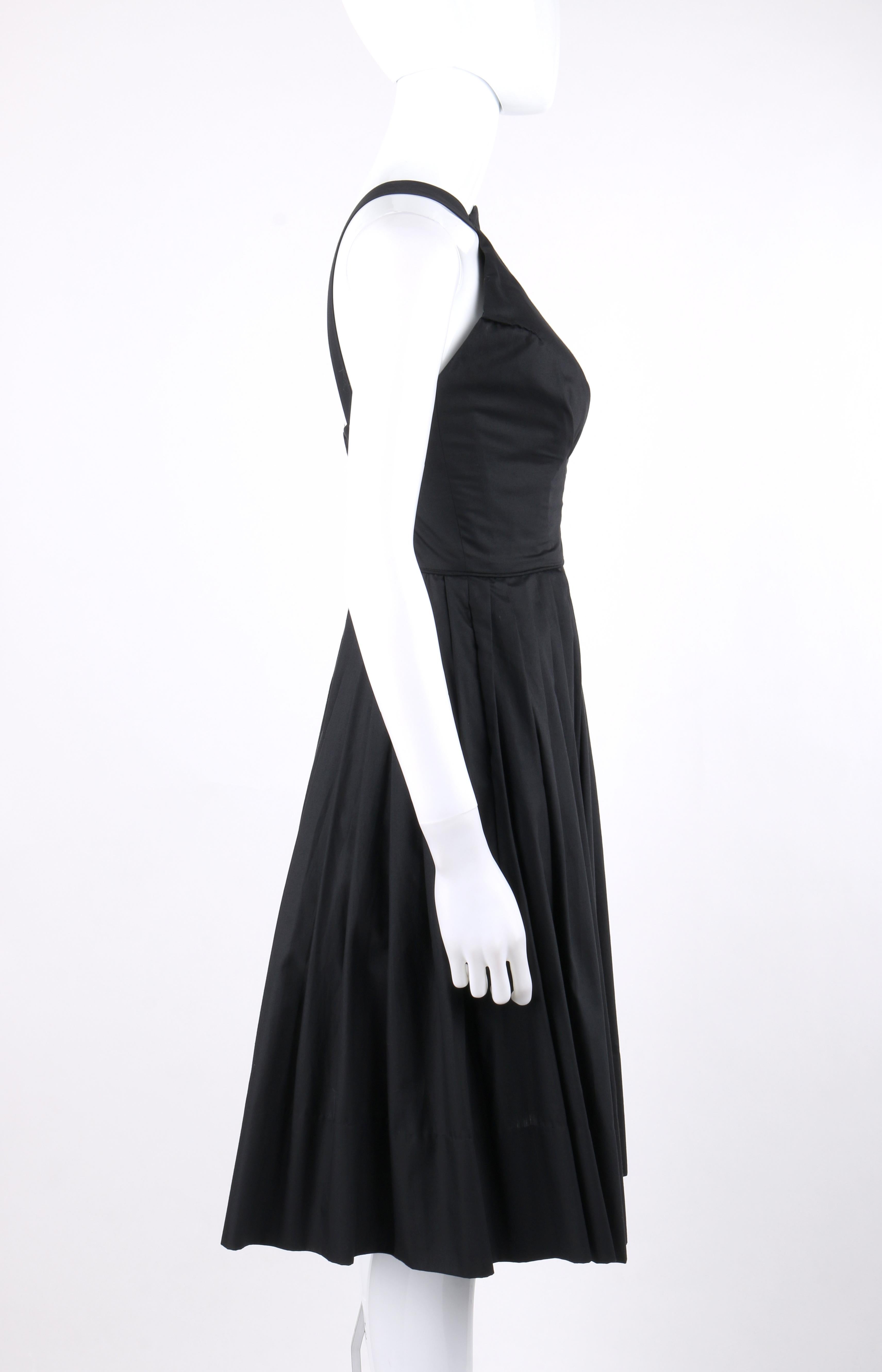 GRETA PLATTRY c.1950’s Midnight Black Pleated Sleeveless Fit N Flare Day Dress

Circa: 1950’s
Label(s): Greta Plattry Original
Designer: Greta Plattry
Style: Fit and flare circle skirt dress
Color(s): Black
Lined: Yes
Unmarked Fabric Content (feel