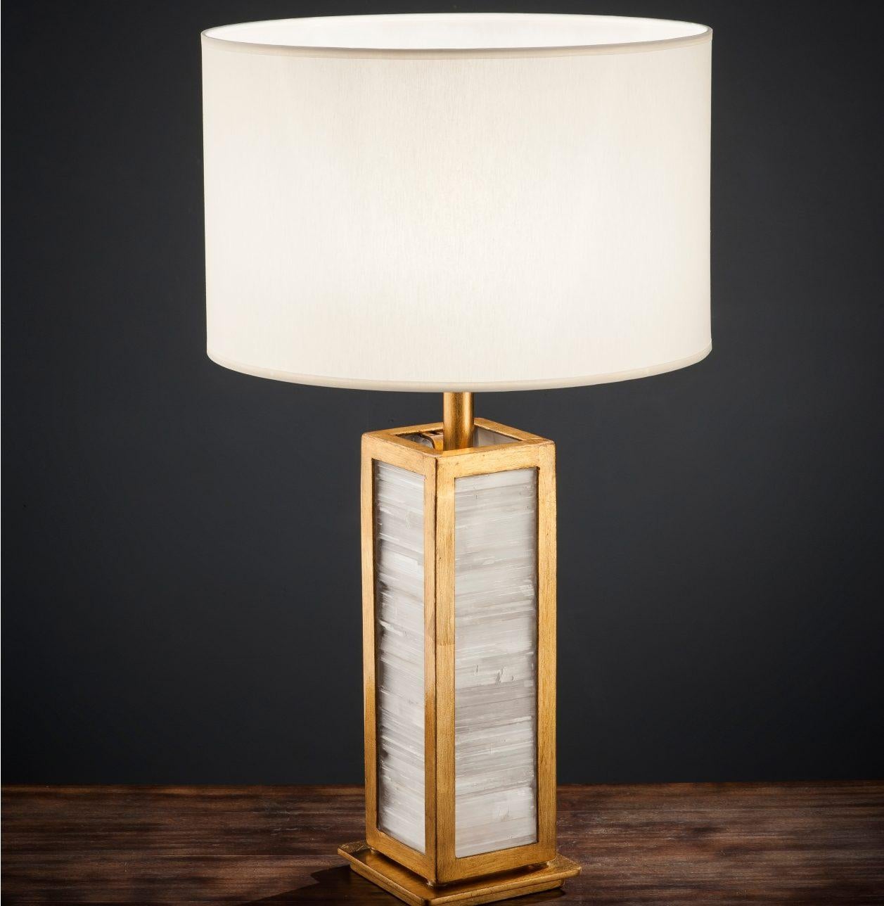 Greta table lamp 
Dimensions: Diameter 40 x Height 80 cm 
Materials: Aluminum with gold leaf. Natural selenite crystal
Lighting: 01 x E27
All our lamps can be wired according to each country. If sold to the USA it will be wired for the USA for