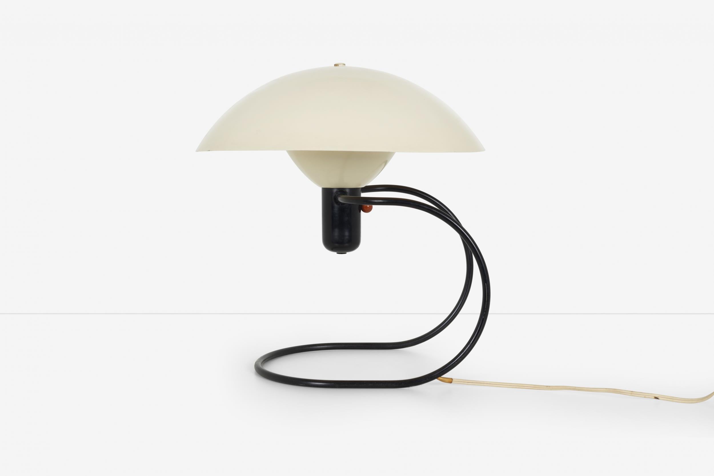 Greta von Nessen Anywhere Lamp Nessen Studio, Inc.
Anywhere as in hang on the wall or desk/table top
1952 enameled metal, plastic.