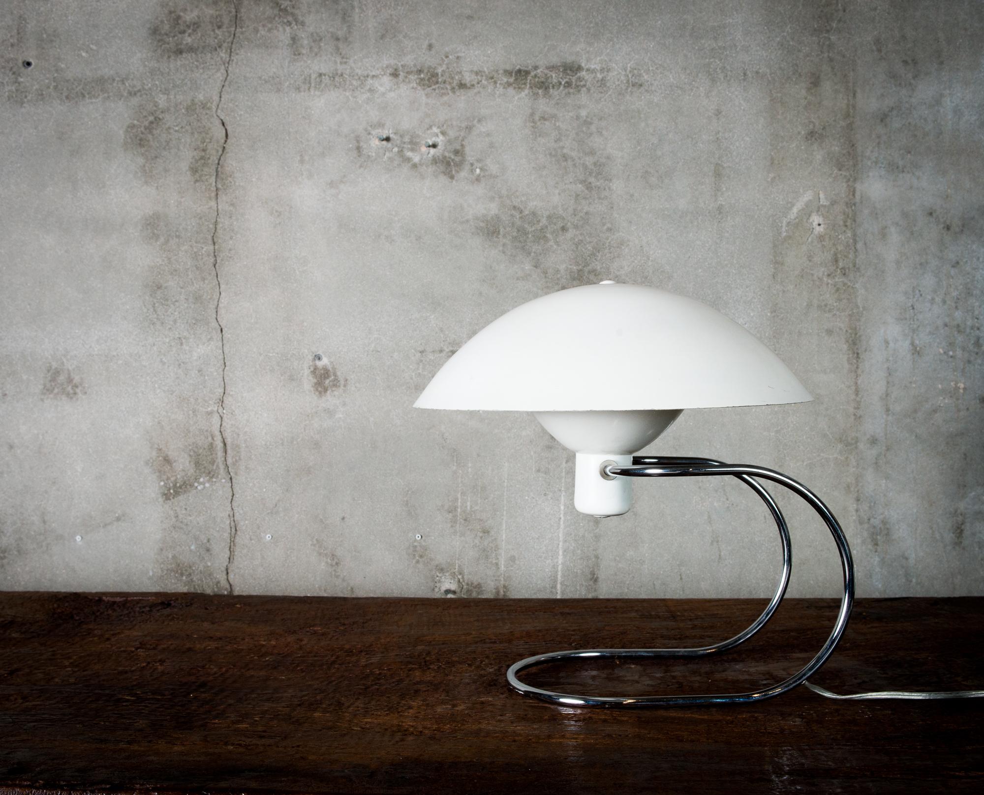 One Greta Von Nessen “Anywhere” table lamp in enameled aluminum and steel.