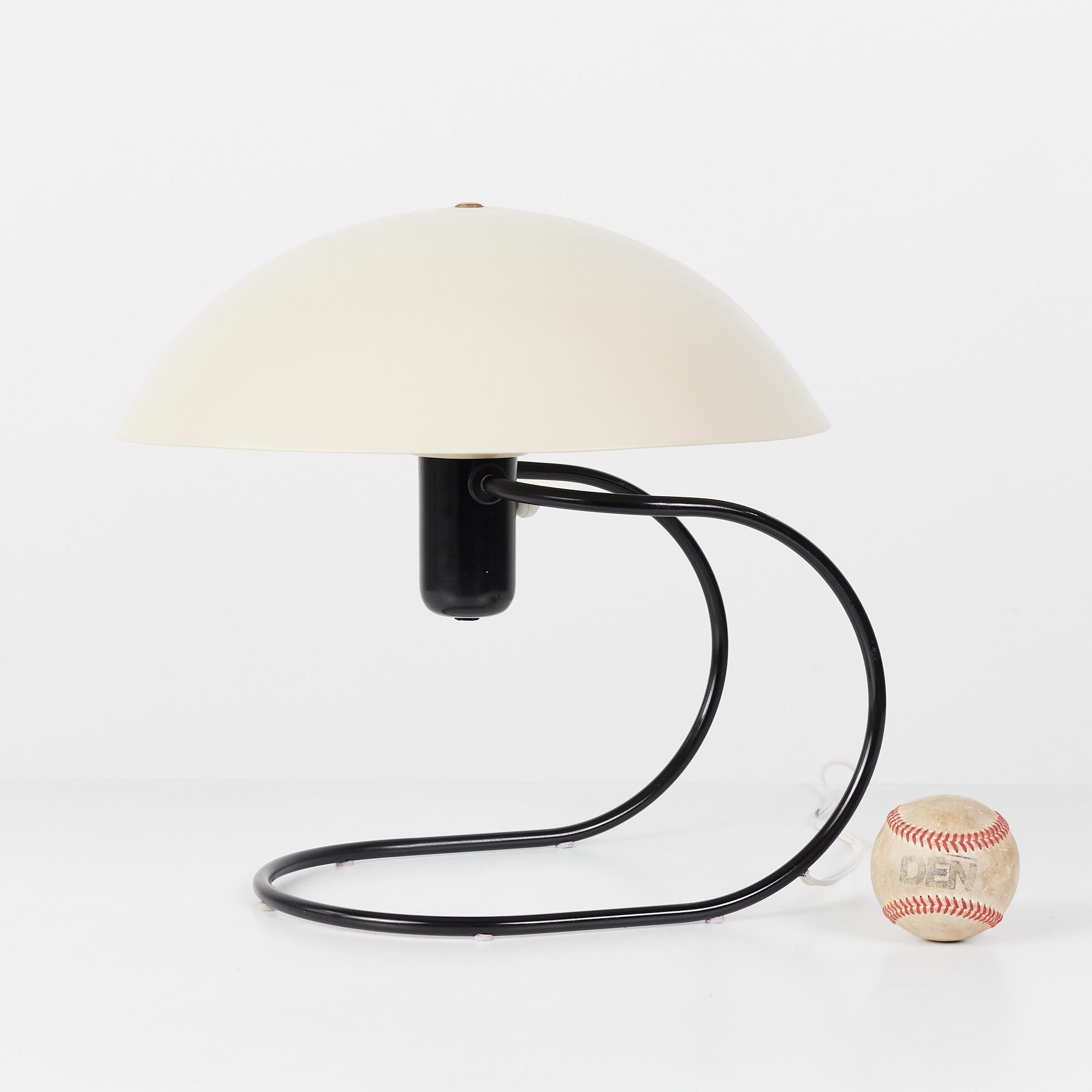 The Anywhere Lamp, designed by Greta von Nessen c.1952, USA, for Nessen Studios. The lamp coined its name by being able to be placed anywhere! It was originally advertised to be used as a table lamp, wall lamp or hanging pendant. It features an