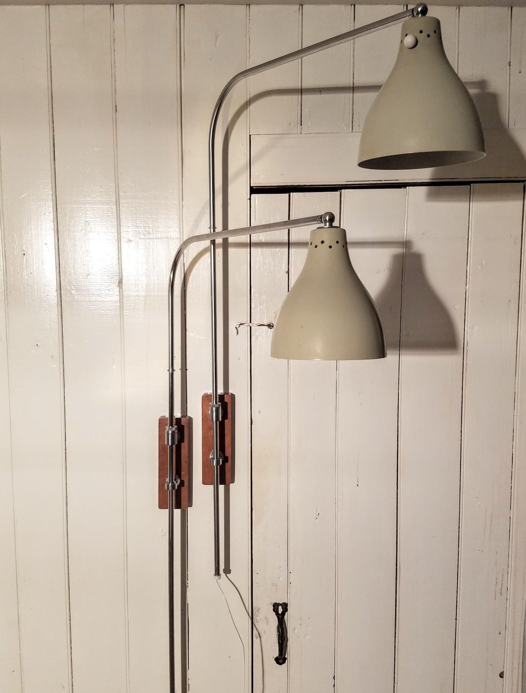 Mid-Century Modern Greta Von Nessen Pair of Adjustable NS 945 Swing Arm Wall Lamps, circa 1950 For Sale